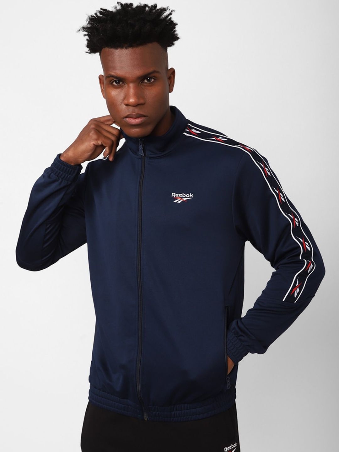 

Reebok Men Classics Vector Tape Logo Printed Sporty Jacket, Navy blue