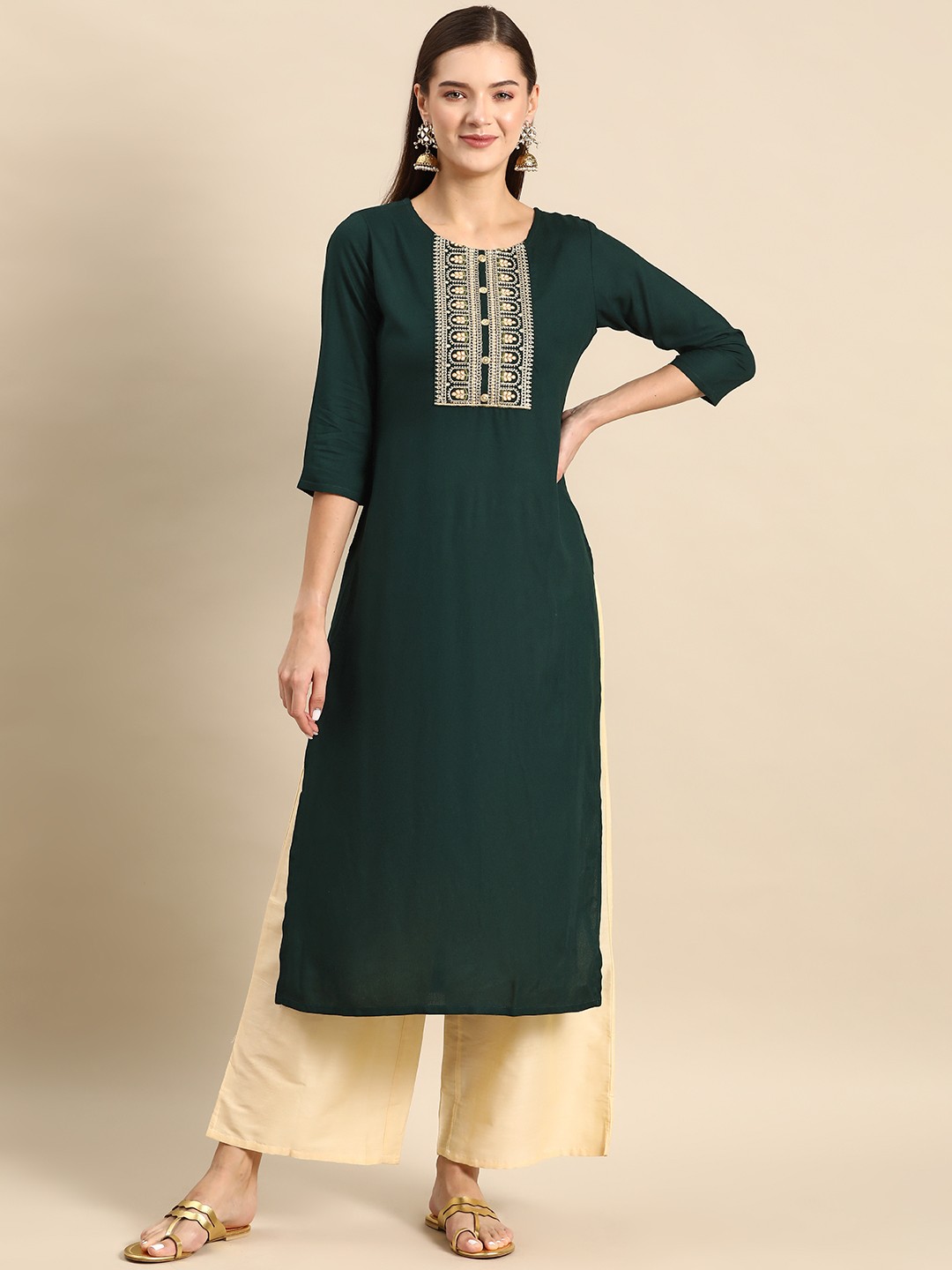 

Nayo Women Yoke Design Thread Work Kurta, Green