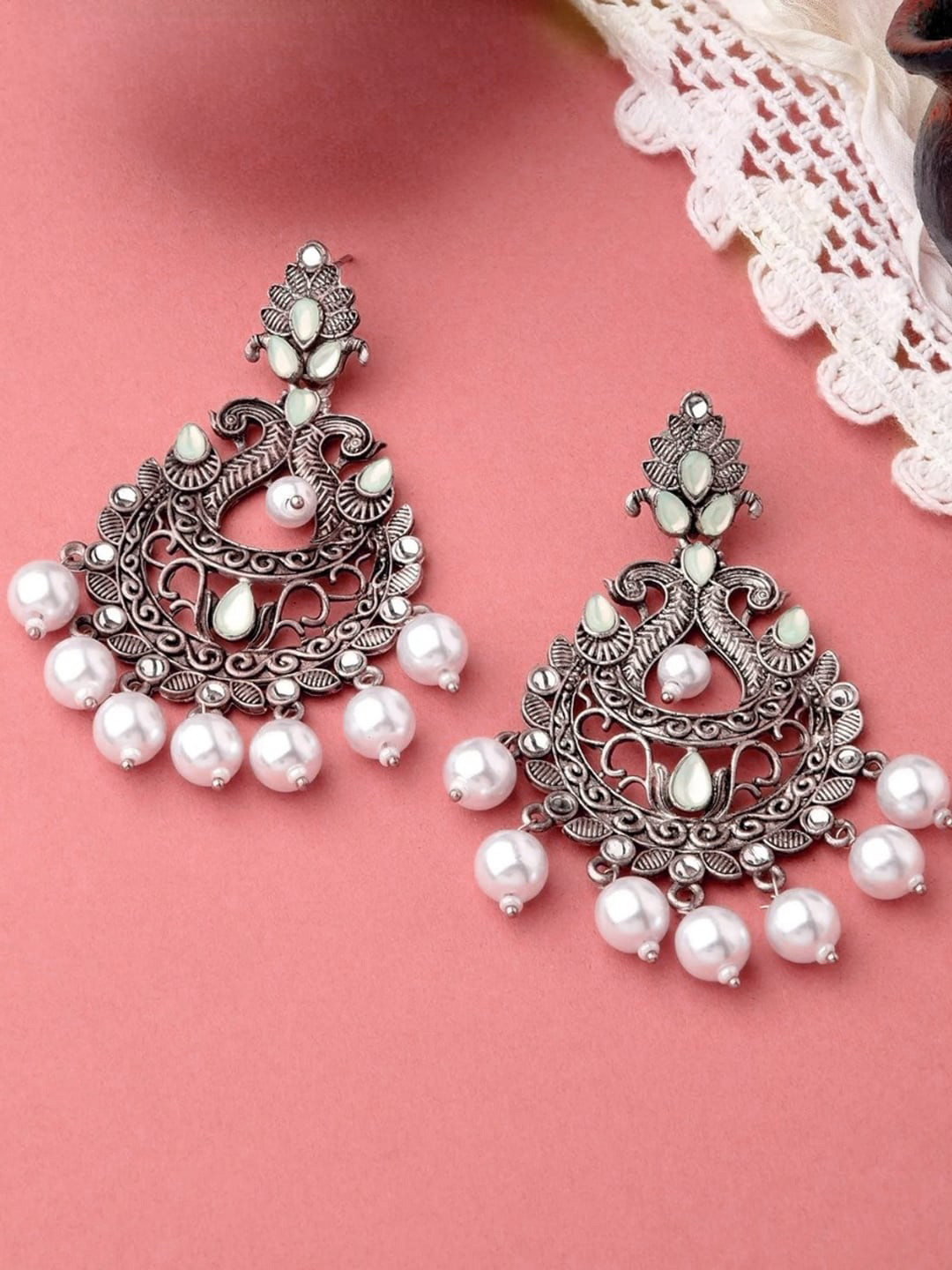 

OOMPH Silver Plated Peacock Shaped Kundan Studded & Beaded Drop Earrings