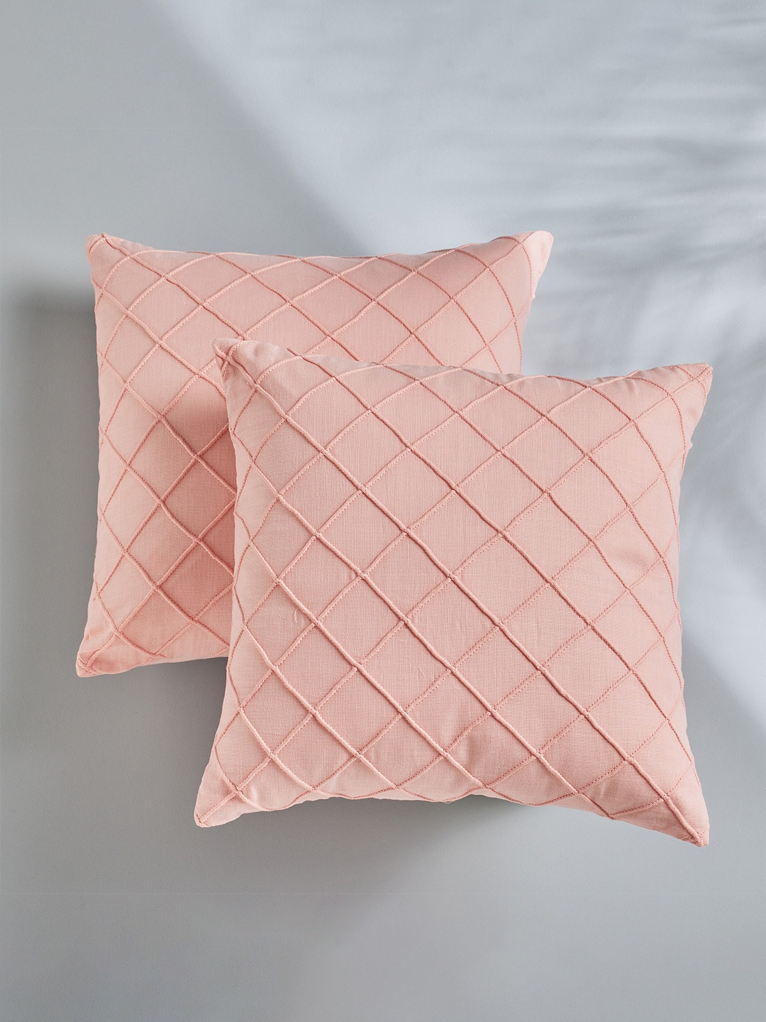 

Home Centre Pink 2 Pieces Geometric Cotton Square Cushion Covers