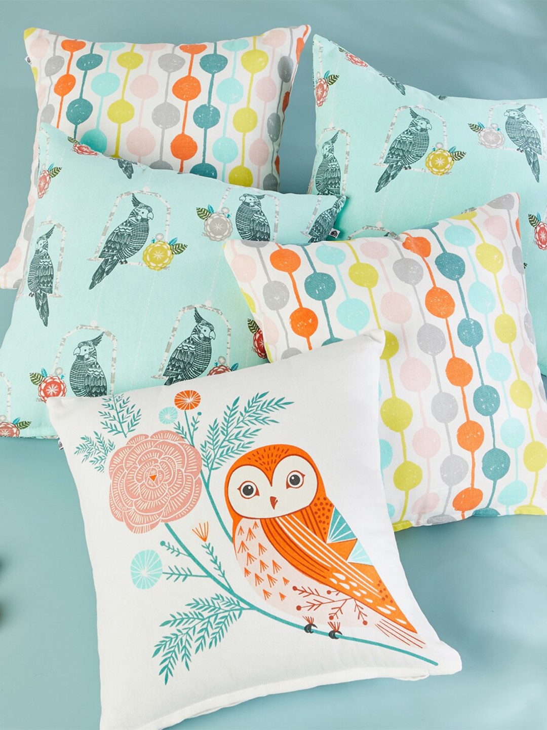 

Home Centre White & Blue 5 Pieces Floral Square Cushion Covers