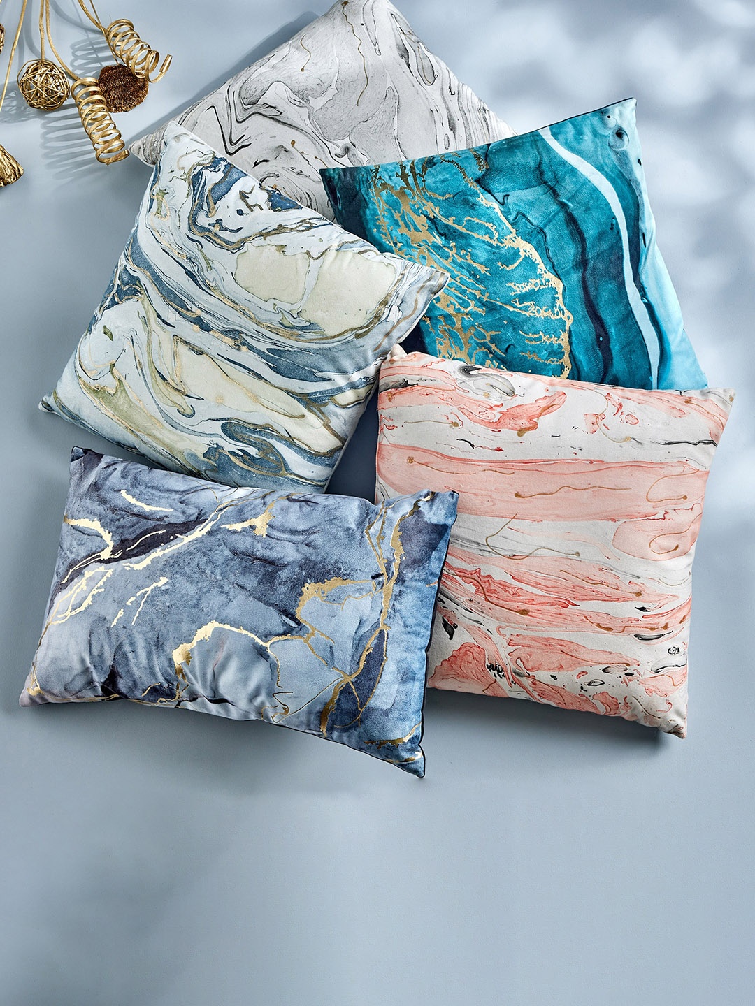 

Home Centre Printed Teal Blue & Golden Reversible Cushion