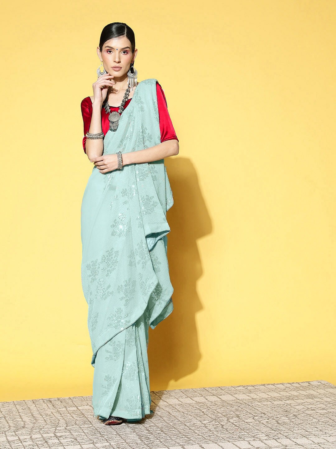 

Kalista Embellished Sequinned Pure Georgette Saree, Turquoise blue