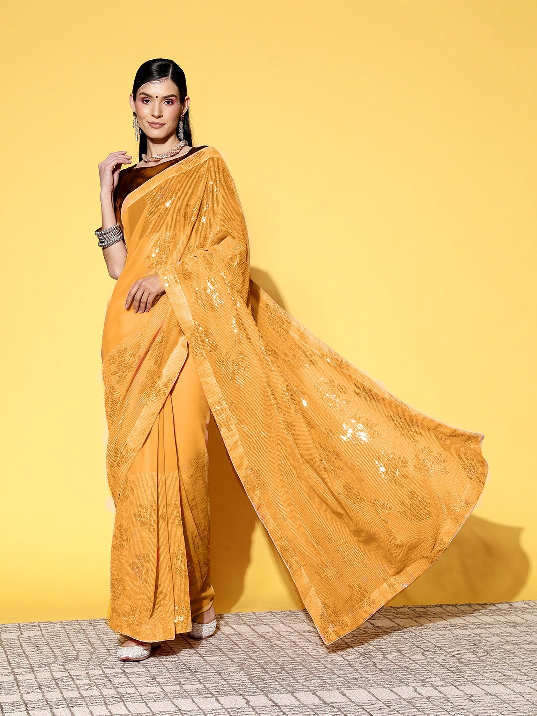

Kalista Embellished Sequinned Pure Georgette Saree, Mustard