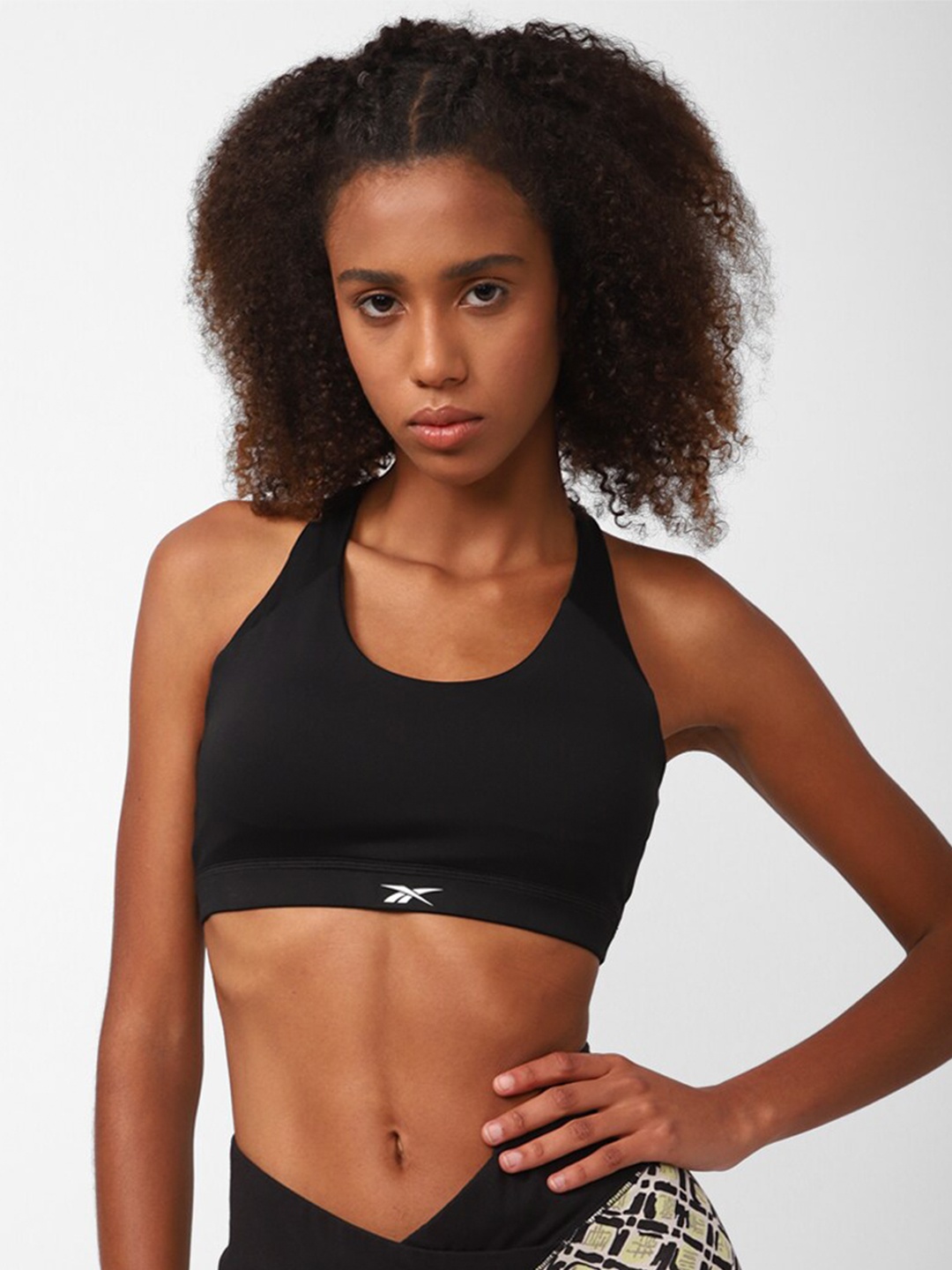 

Reebok Logo Printed Training WOR Low Impact Sports Bra, Black