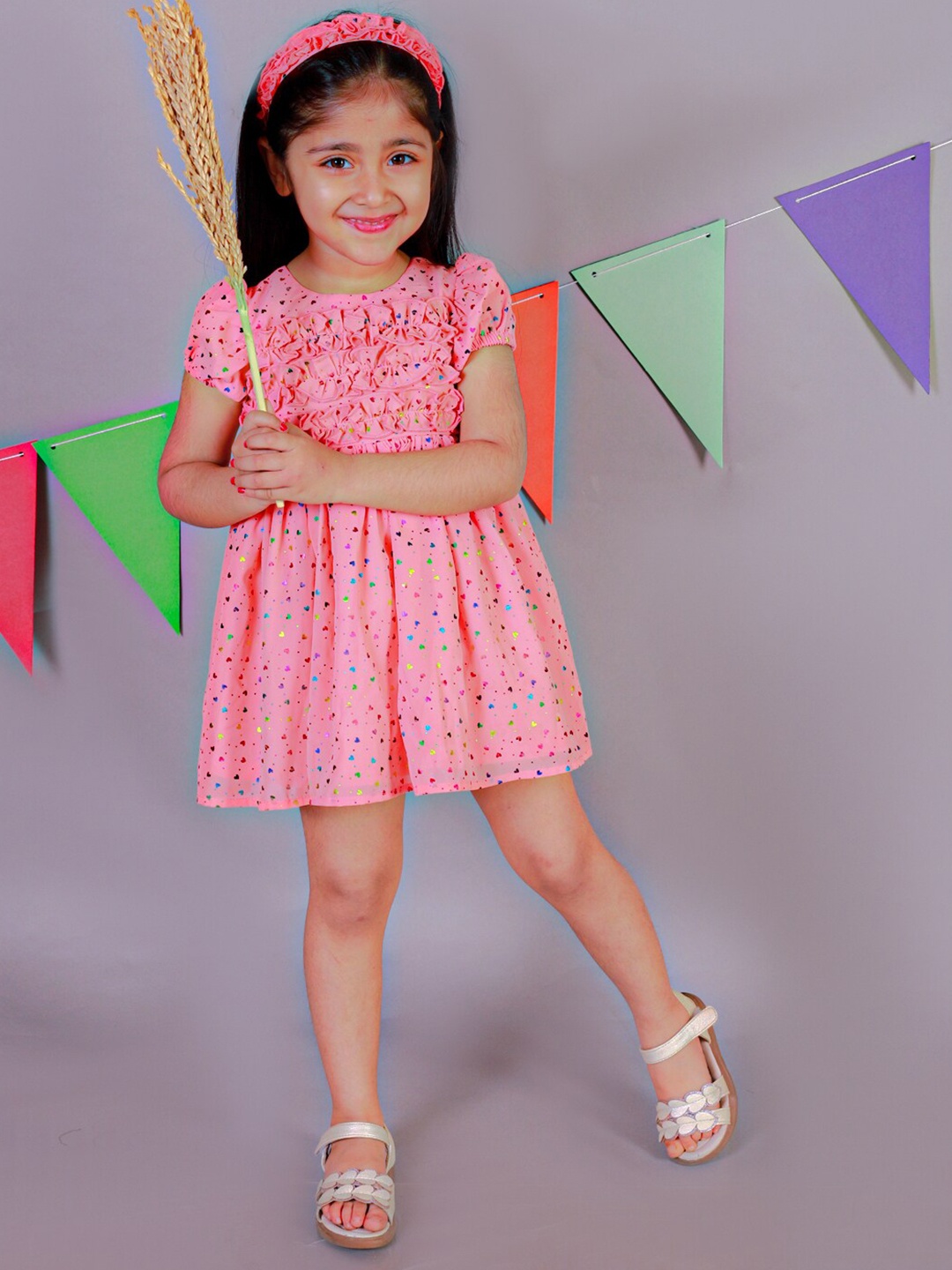 

KidsDew Girls Conversational Printed Ruffled Fit & Flare Dress With Hairband & Bloomer, Peach