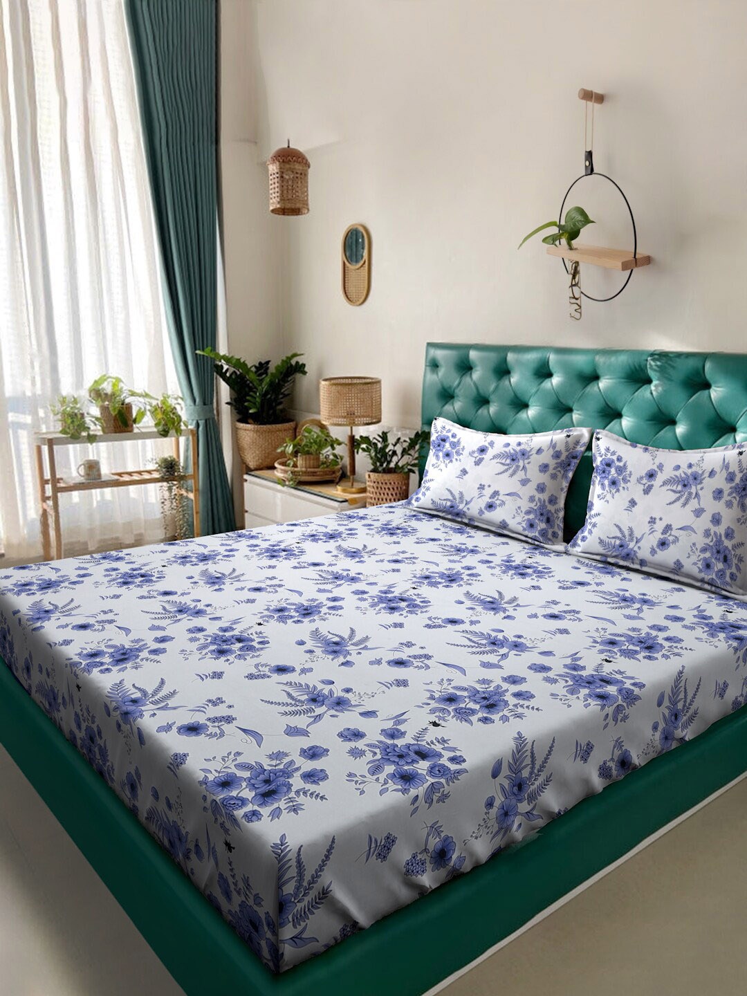 

Alina decor White & Blue Floral 210 TC Queen Bedsheet with 2 Pillow Covers