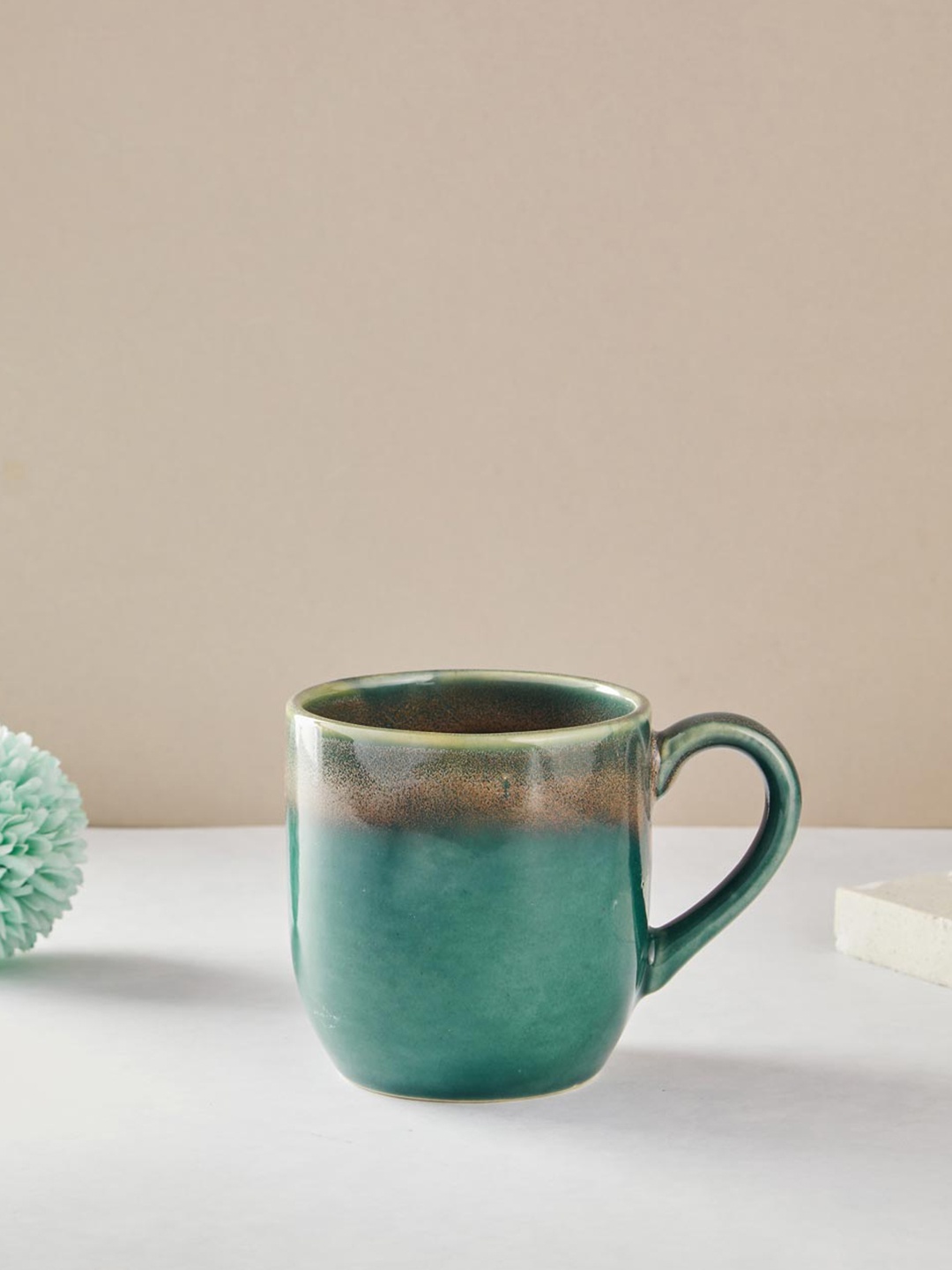 

Fabindia Adhrit Green 1 Piece Ceramic Matte Mug-240ml