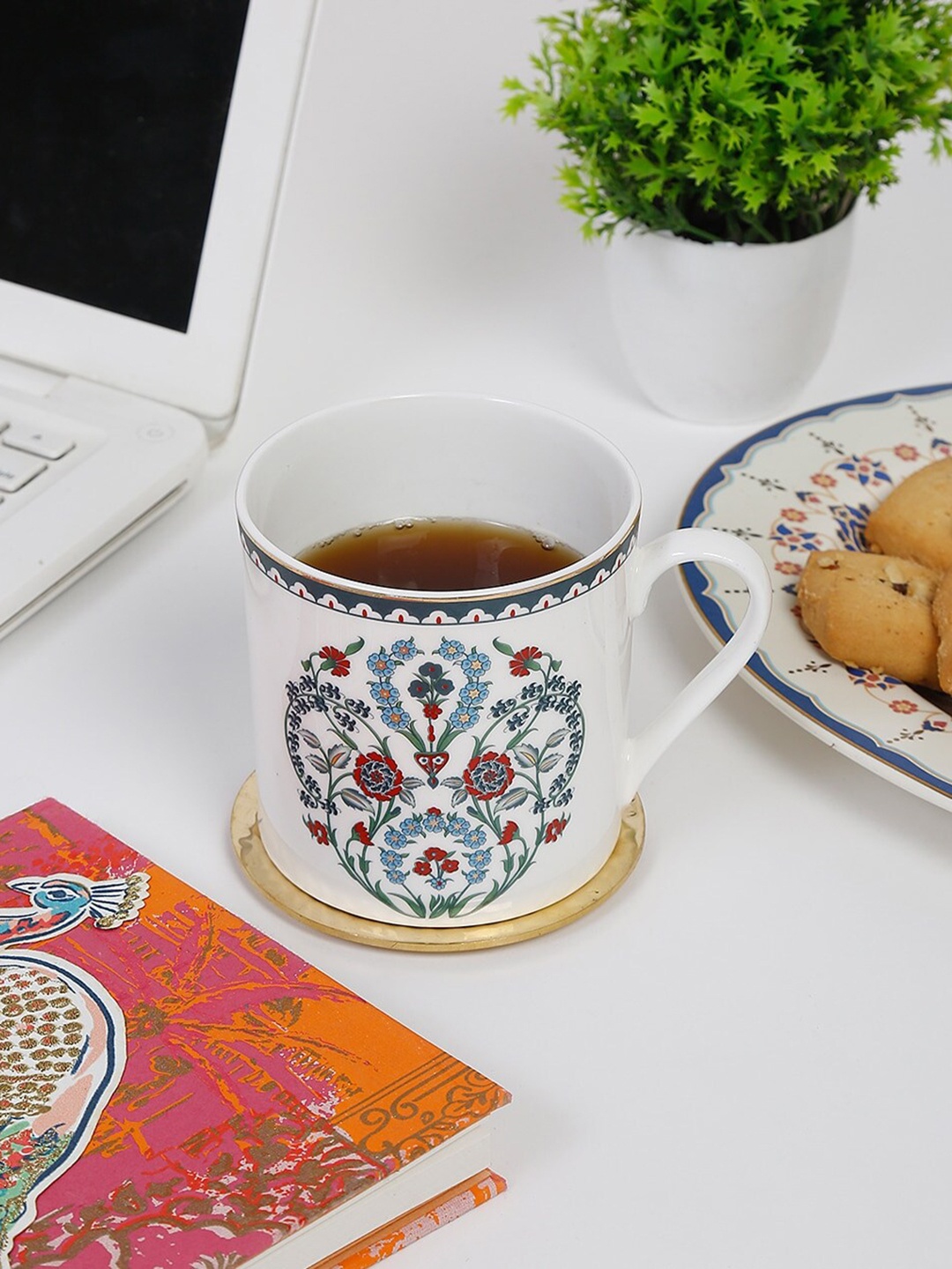 

Fabindia Avasa White & Blue 1 Piece Ethnic Motifs Printed Ceramic Matte Mug-300ml
