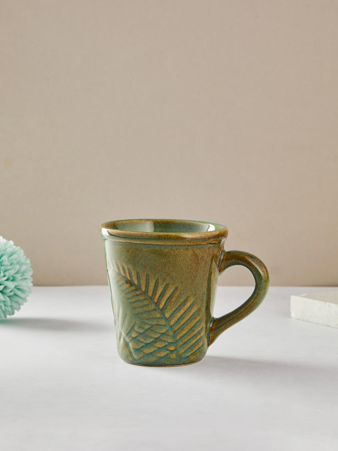 

Fabindia Adhrit Green Textured Ceramic Glossy Mug-200ml
