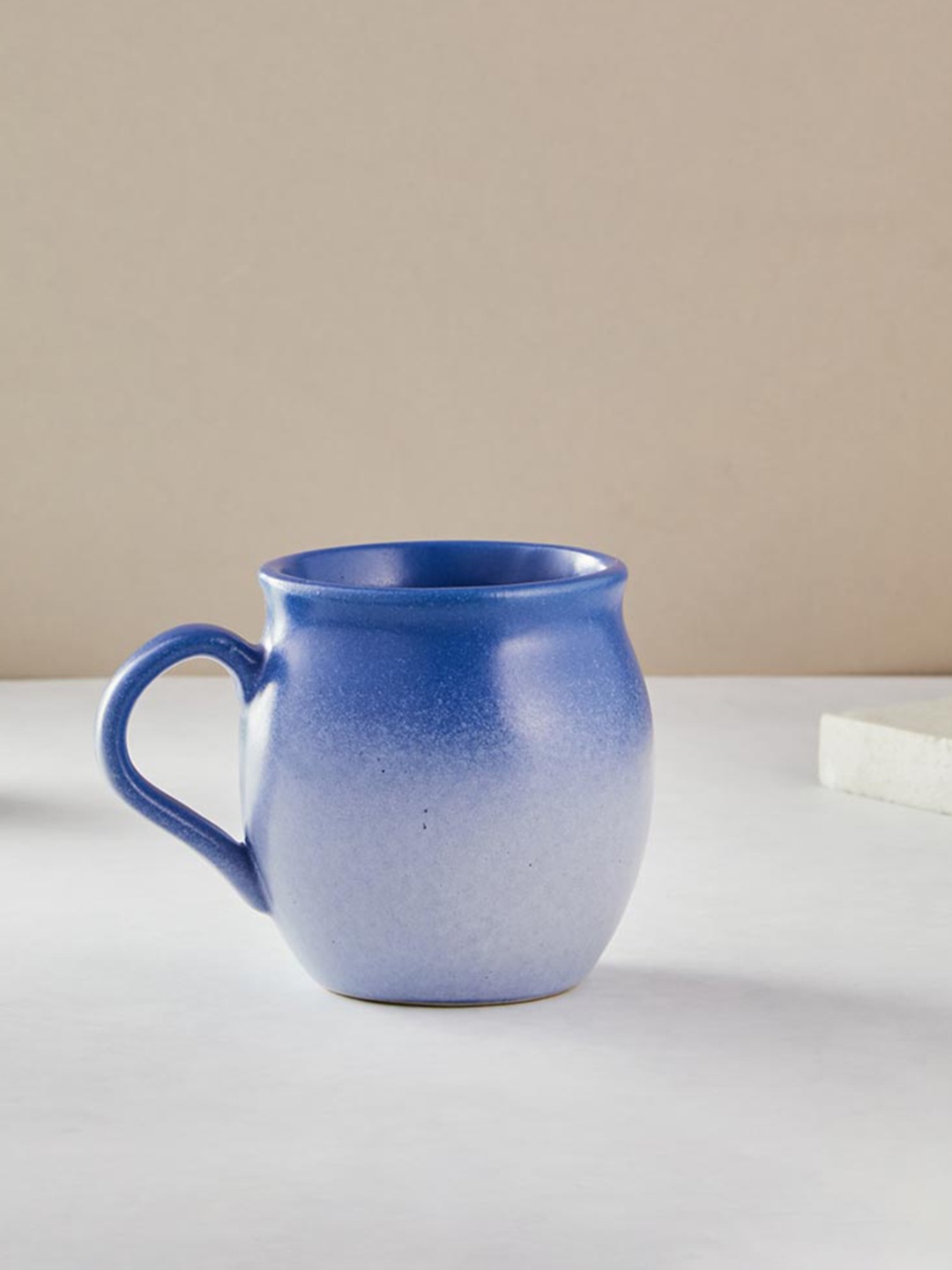 

Fabindia Adhrit Blue Ceramic Glossy Mug - 250 ml