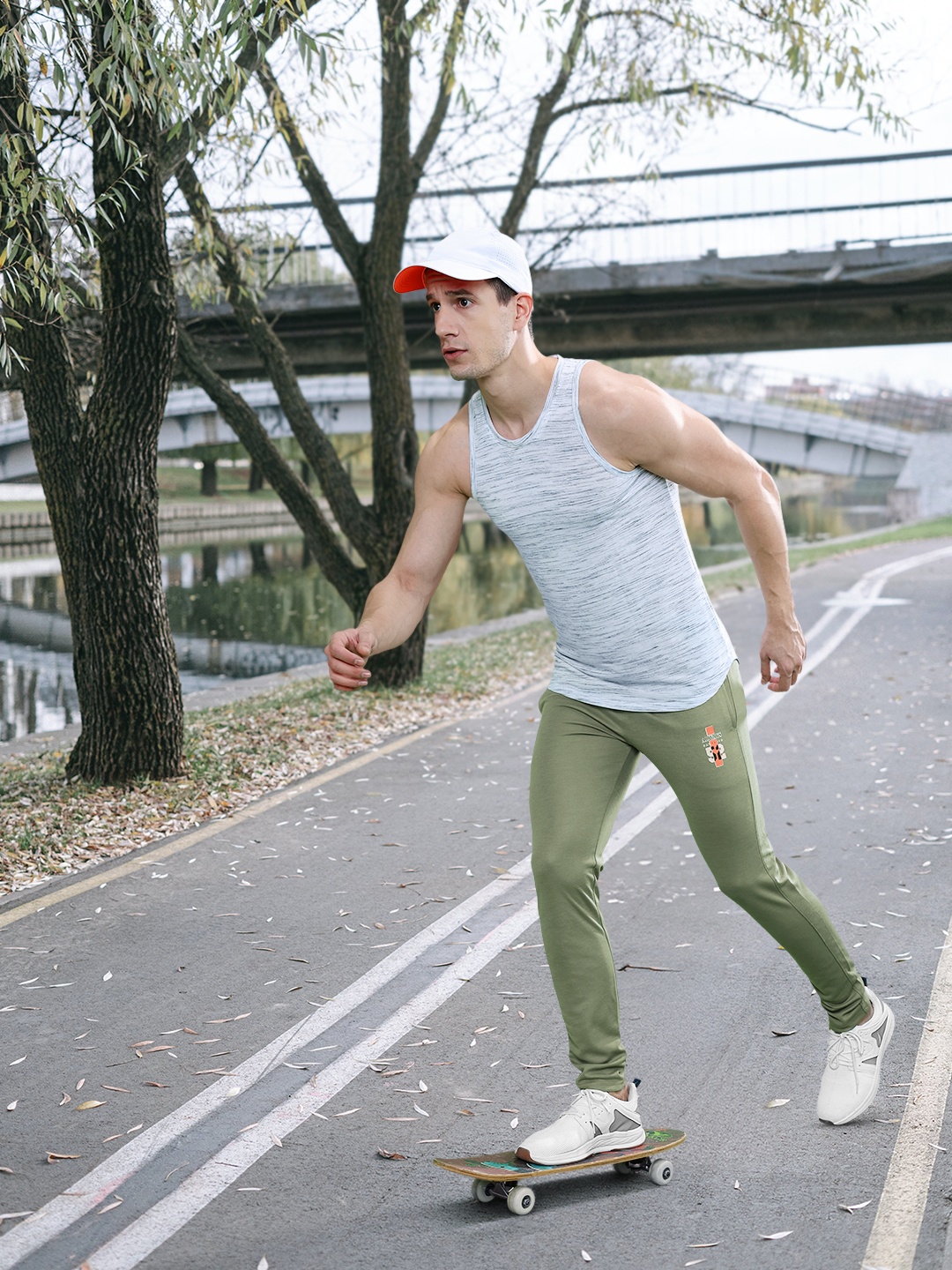 

Sports52 wear Men Printed Slim Fit Training Track Pants, Olive