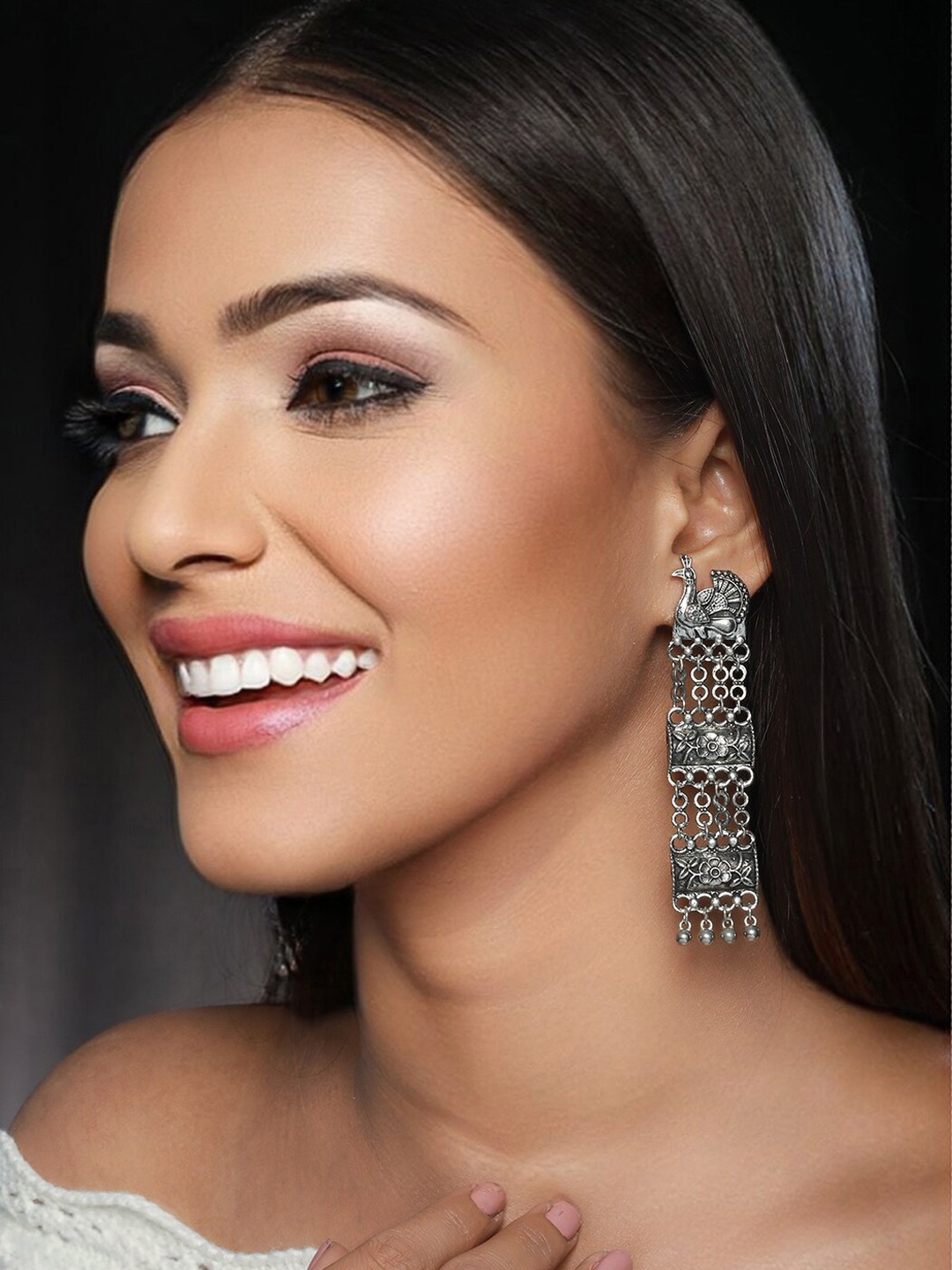 

Priyaasi Silver-Toned Peacock Shaped Drop Earrings