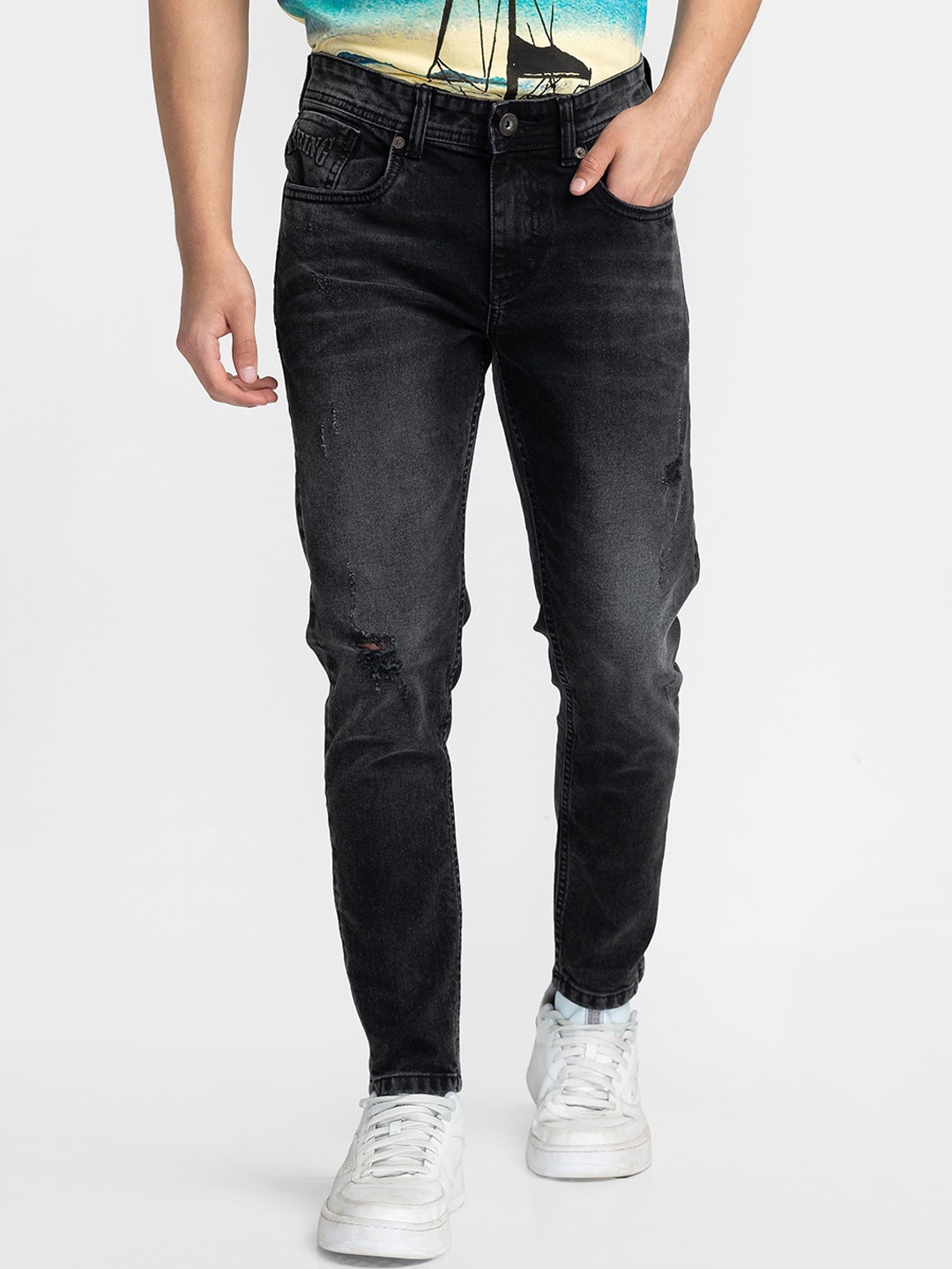 

Being Human Men Mid-Rise Mildly Distressed Light Fade Jeans, Black