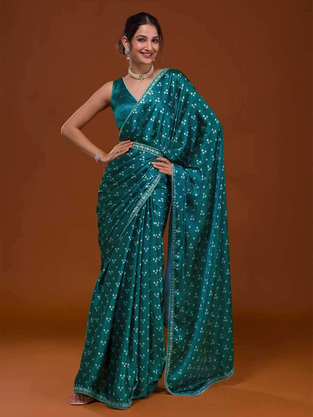 

Nityanta Fab Bandhani Embroidered Satin Ikat Saree, Turquoise blue