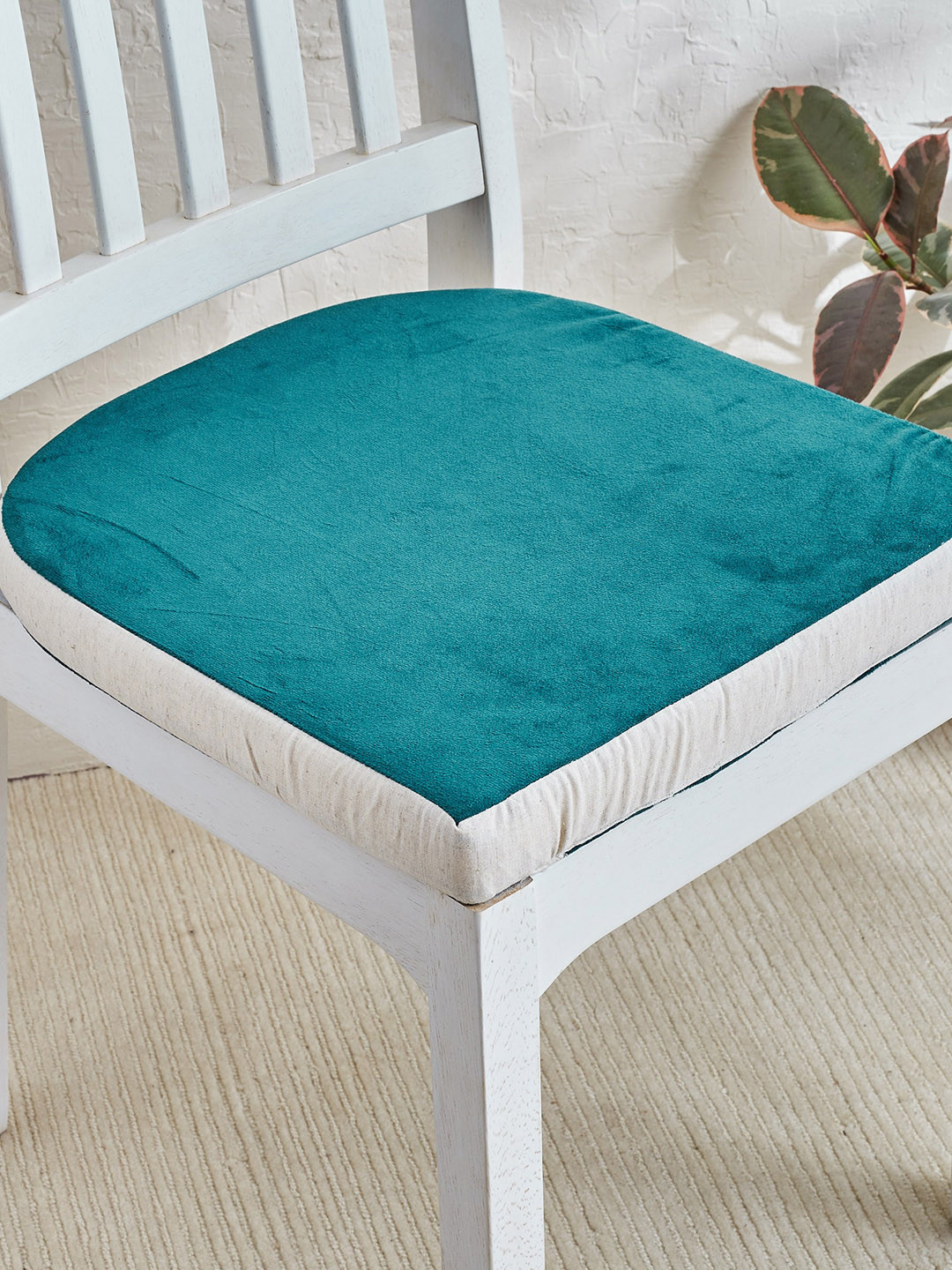 

Home Centre Turquoise Blue Foam Filled Velvet Chair Pad