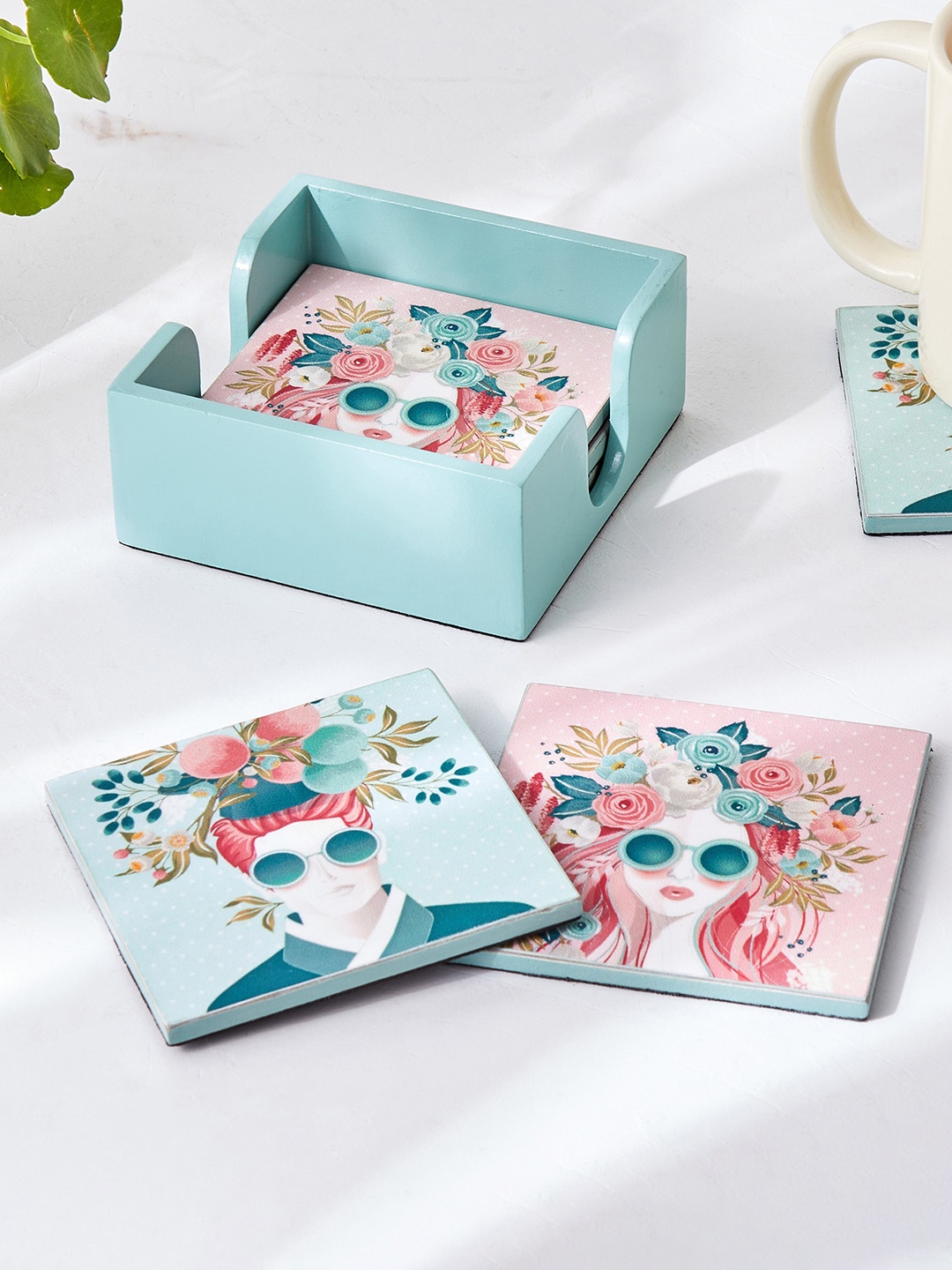 

Home Centre Teal Blue & Pink 6 Pieces Printed Wooden Coasters With Holder