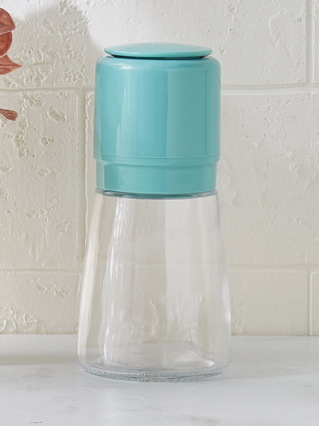 

Home Centre Pamolive Perch Teal & Transparent Perch Acrylic Pepper Mill -160 ml