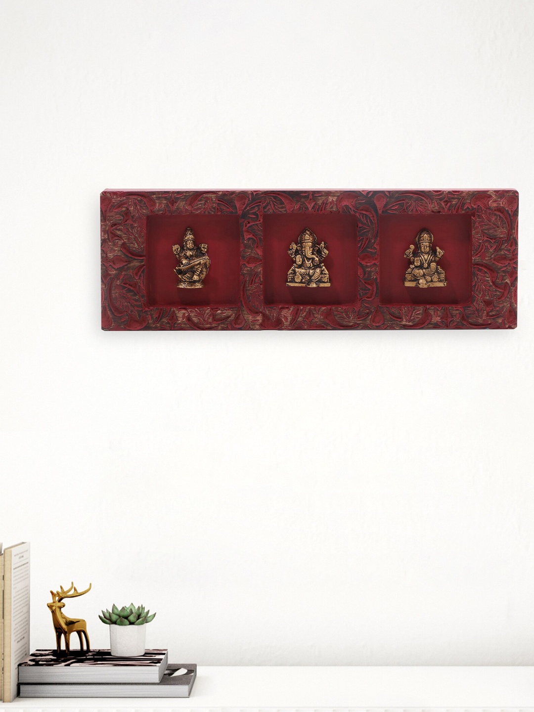 

Home Centre Red & Gold Toned Chisel Wall Accent with Figurines