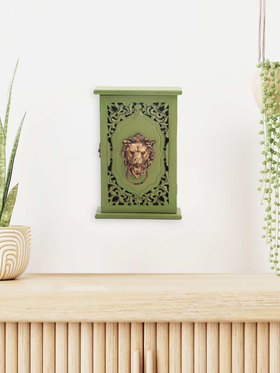

Home Centre Chisel Green Wooden Key Box With Lion Figurine