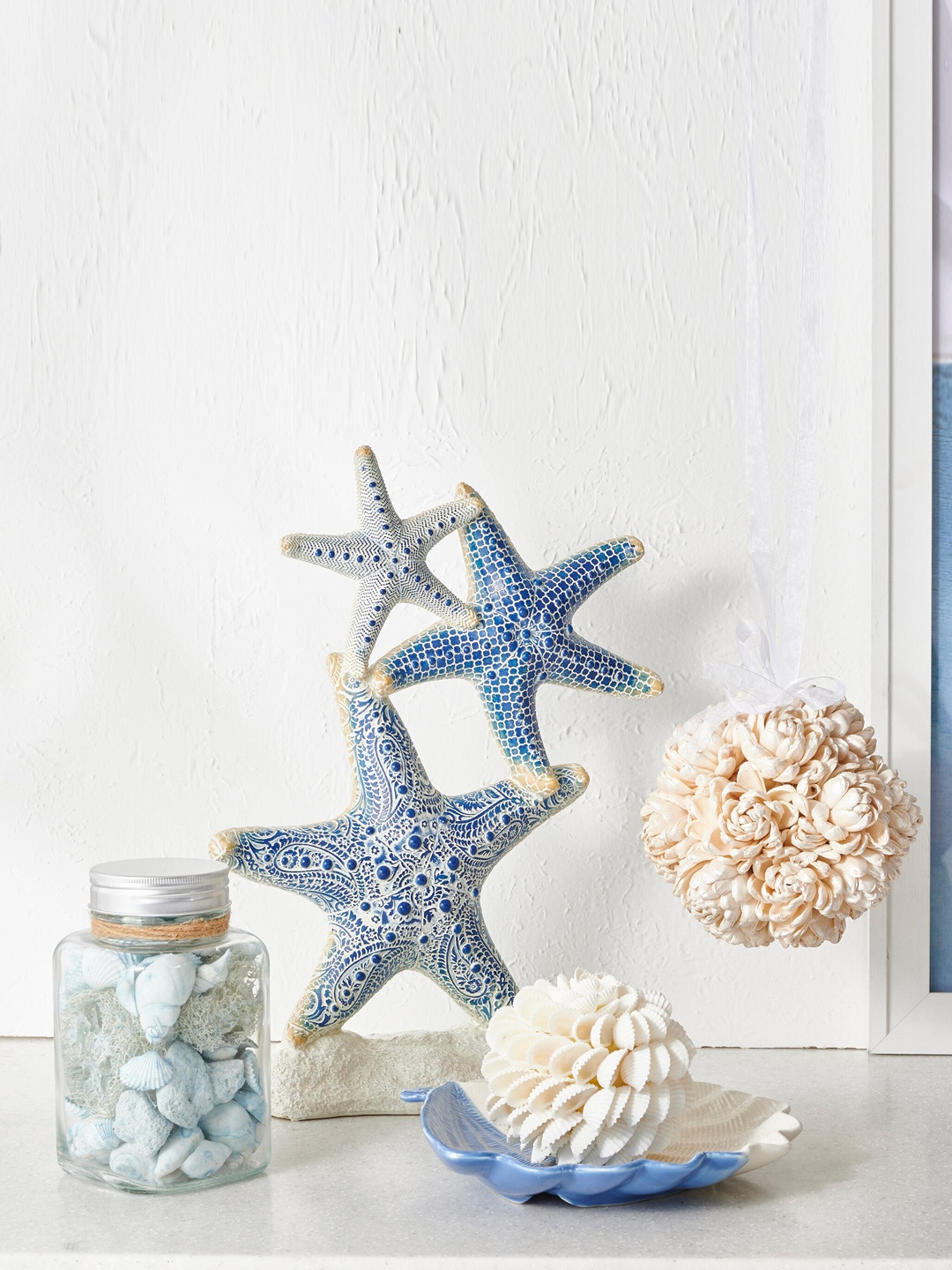

Home Centre White Sea Shell Decorative Showpieces