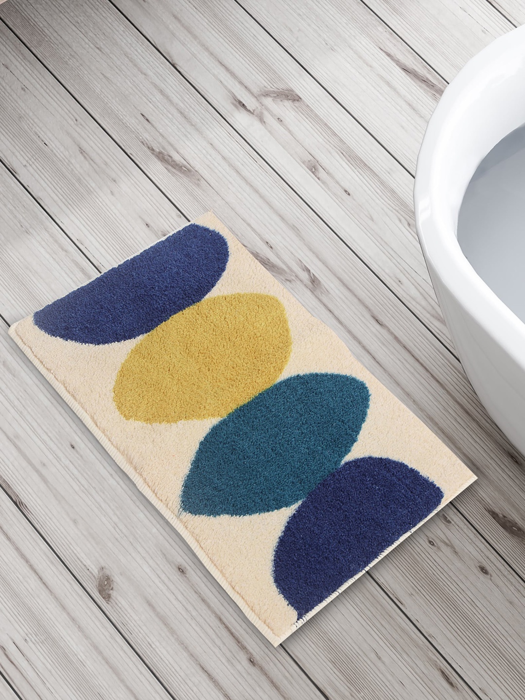 

Home Centre Beige Harbour Abstract Anti-Slip 1400 GSM Bath Rugs- 40x60cm