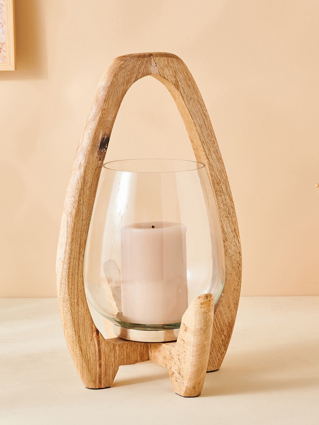 

Home Centre Selena Transparent Glass Lantern With Wooden Frame
