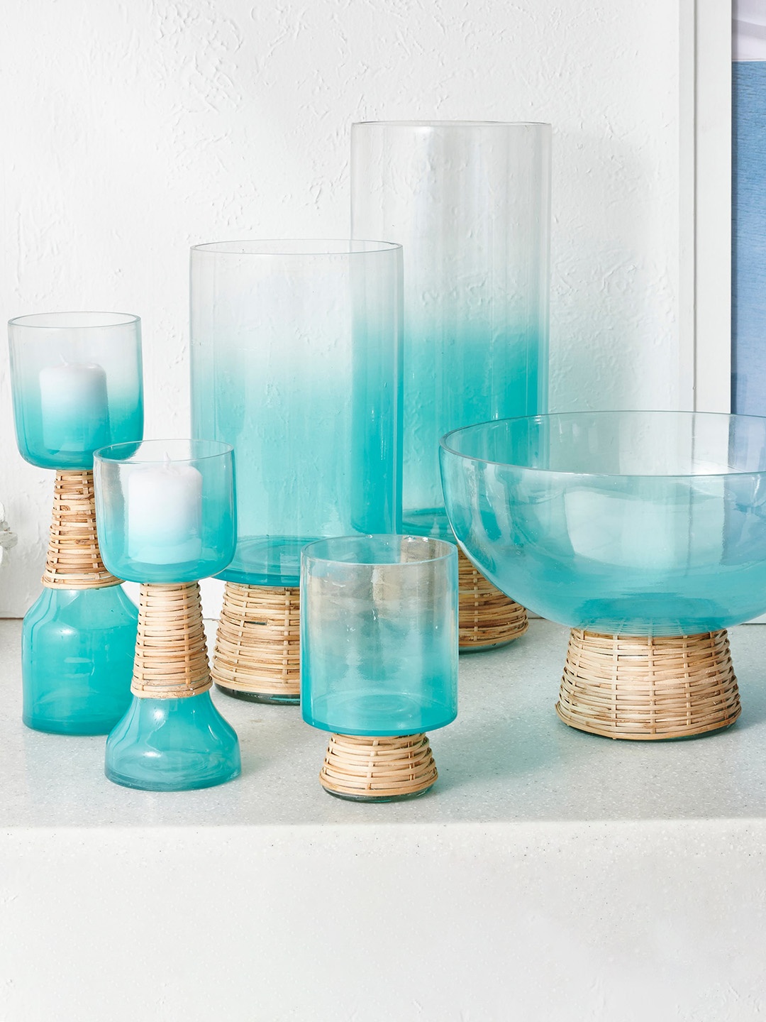 

Home Centre Splendid Santorini Blue Glass Rattan Candle Holder