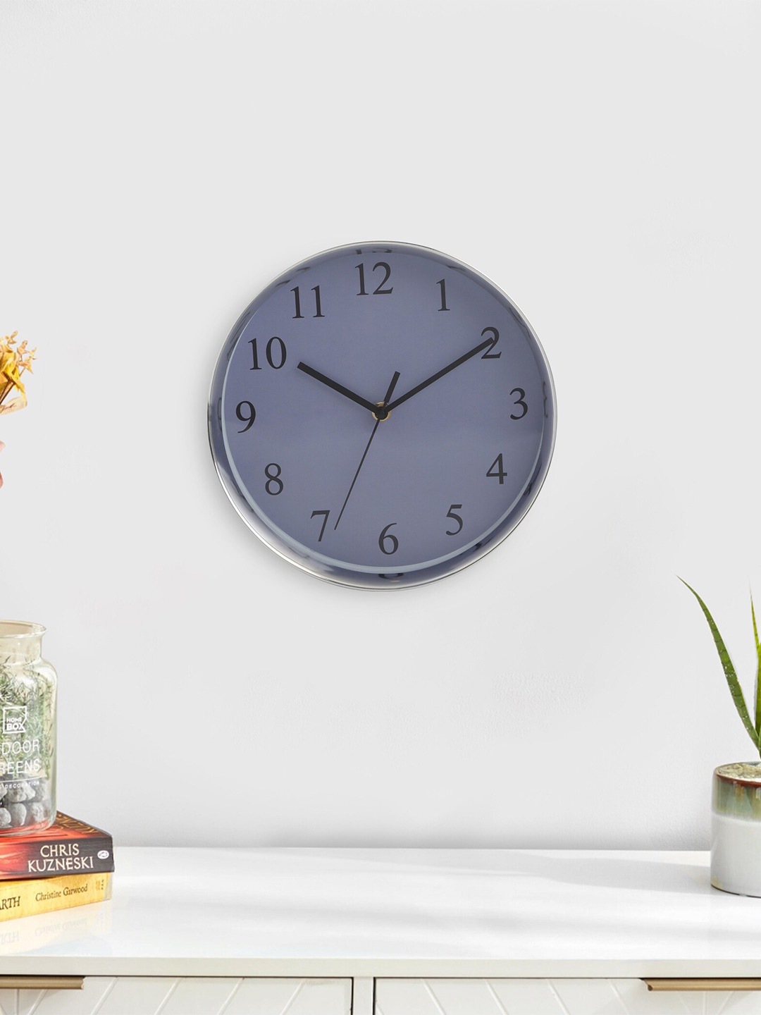 

Home Centre Purple Contemporary Wall Clock
