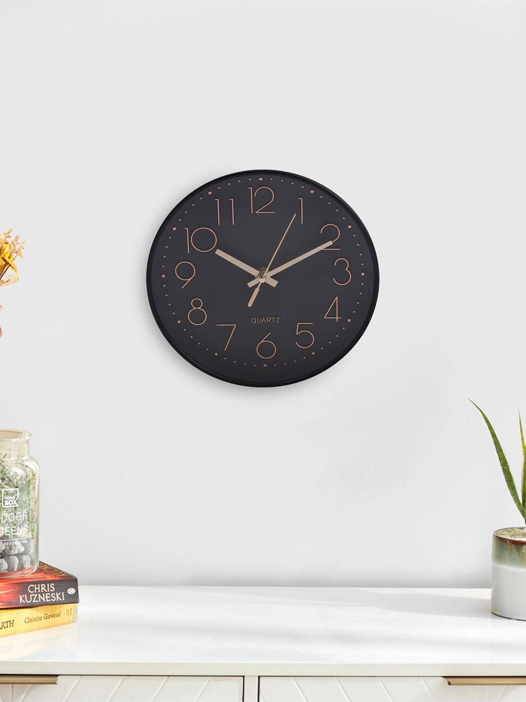 

Home Centre Black Analogue Contemporary Wall Clock