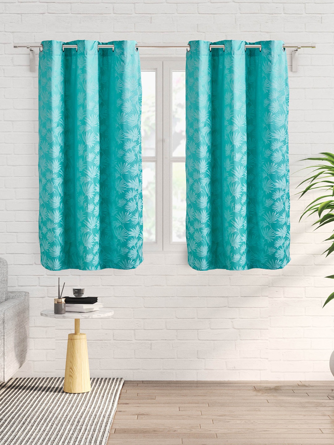 

Home Centre Griffin Teal 2 Pieces Floral Jacquard Black Out Window Curtains