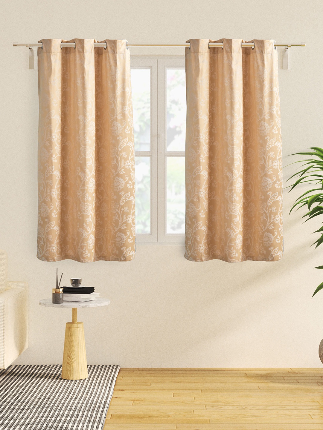 

Home Centre Griffin Beige 2 Pieces Floral Printed Black Out Jacquard Window Curtains