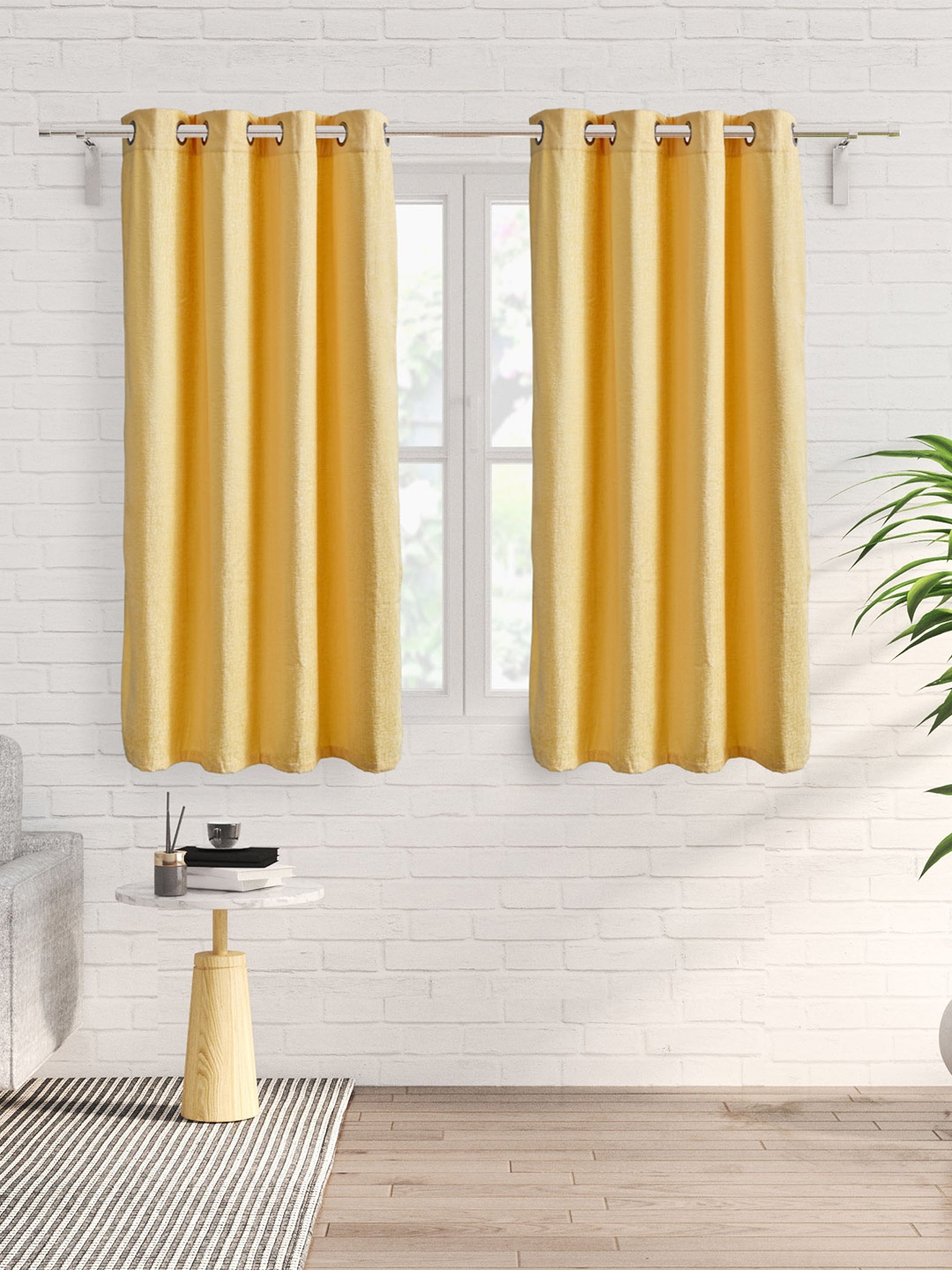 

Home Centre Calamus Yellow 2 Pieces Black Out Jacquard Window Curtains