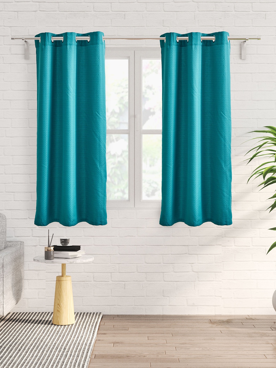 

Home Centre Sierra Blue 2 Pieces Self Design Black Out Jacquard Window Curtains