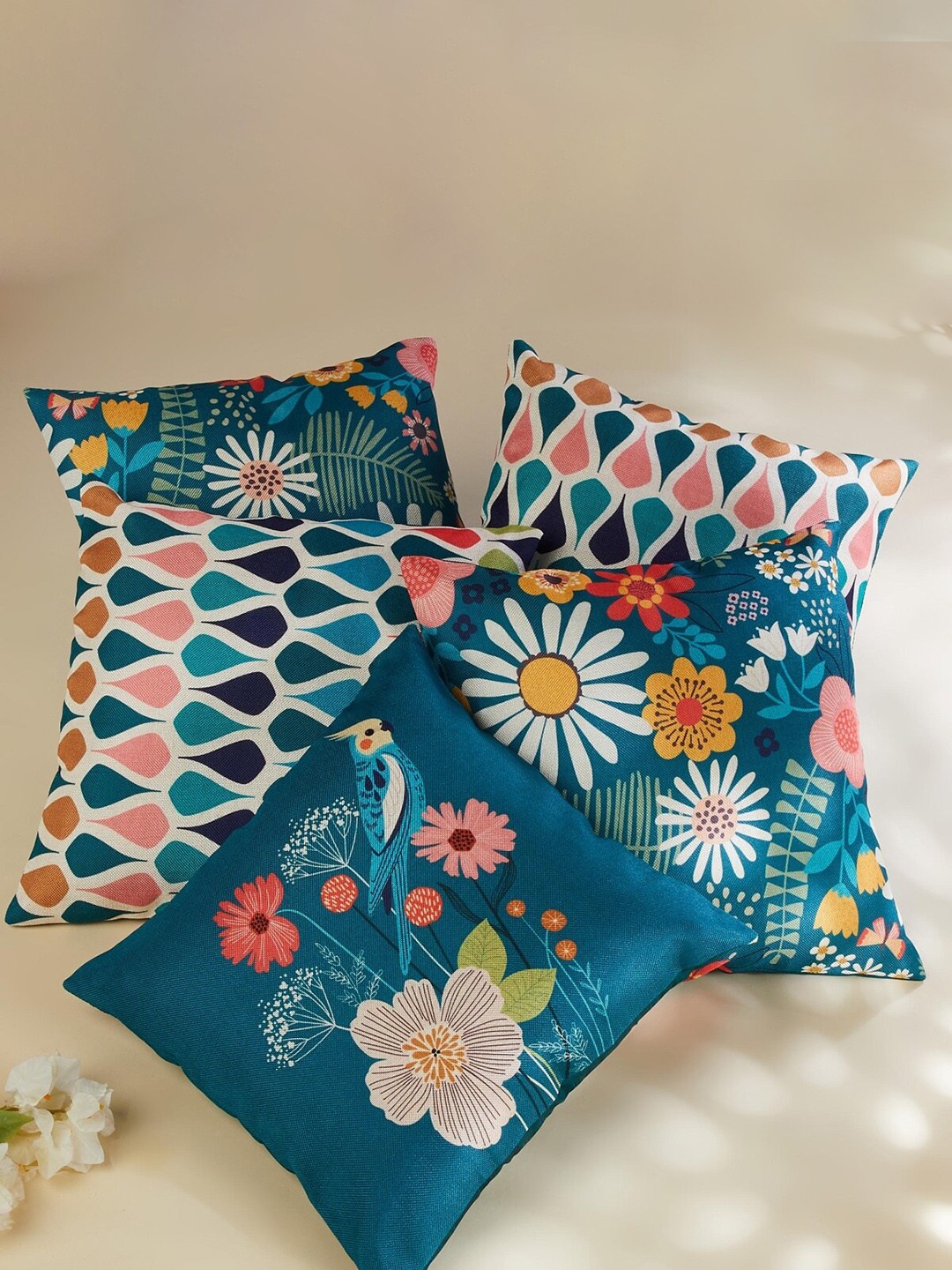 

Home Centre Pacific Vera Teal & White 5 Pieces Floral Square Cushion Covers
