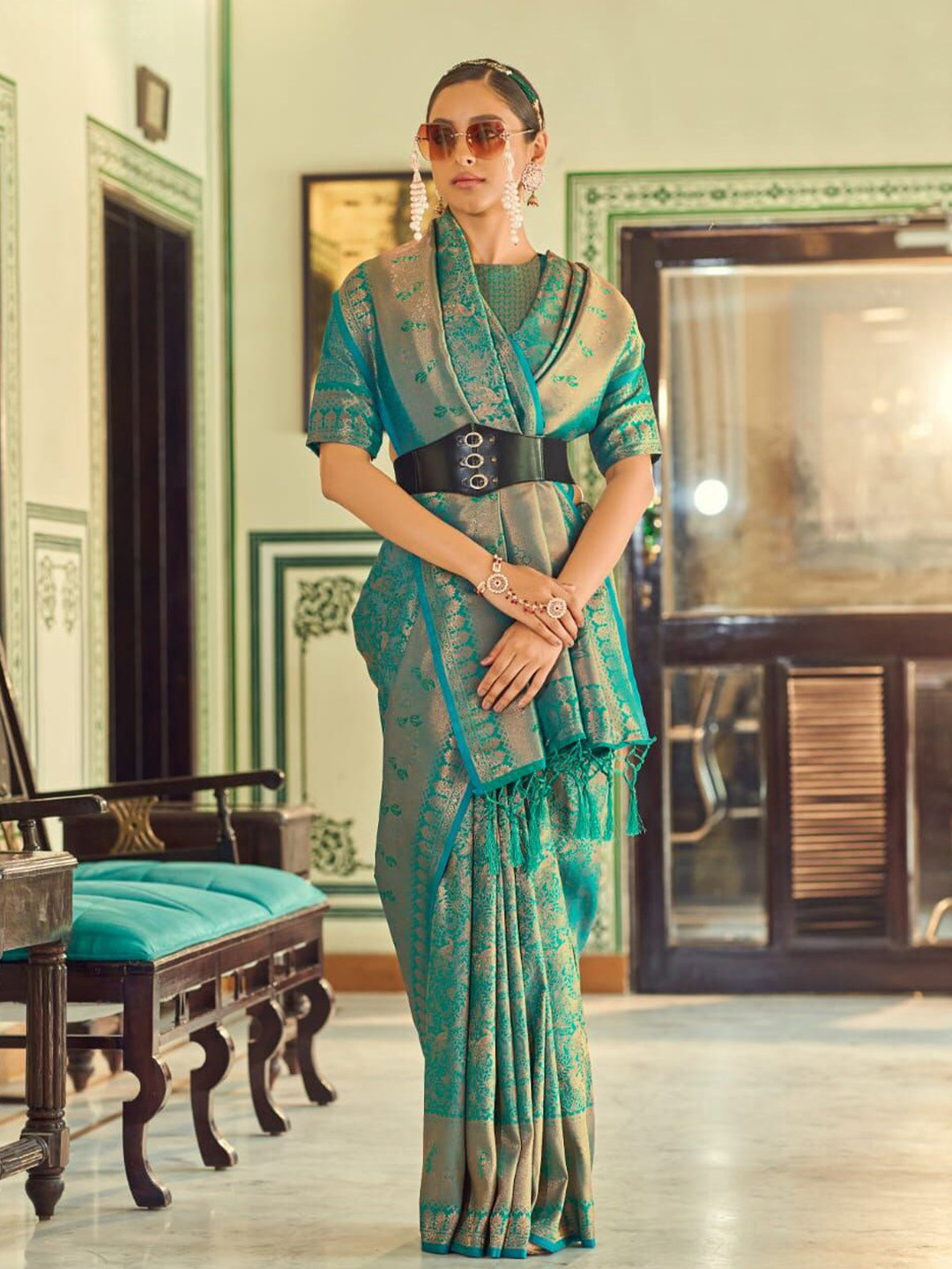 

Mitera Green & Gold-Toned Ethnic Motifs Woven Design Zari Saree