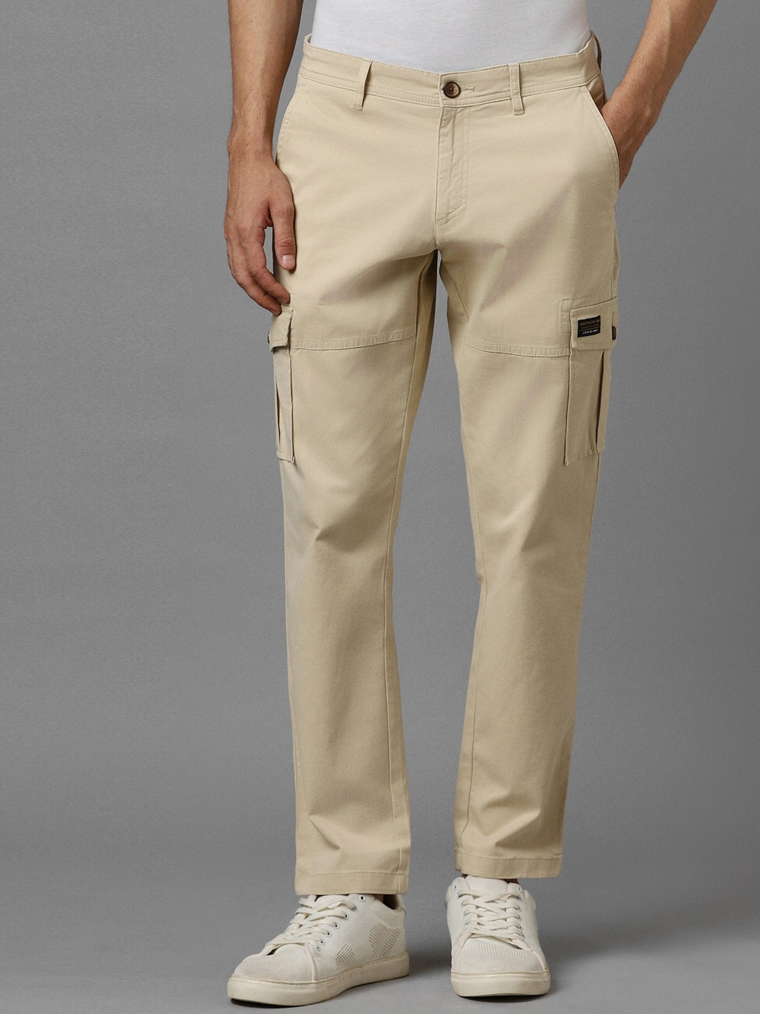 

Louis Philippe Jeans Men Mid-Rise Cotton Slim Fit Cargos Trousers, Cream