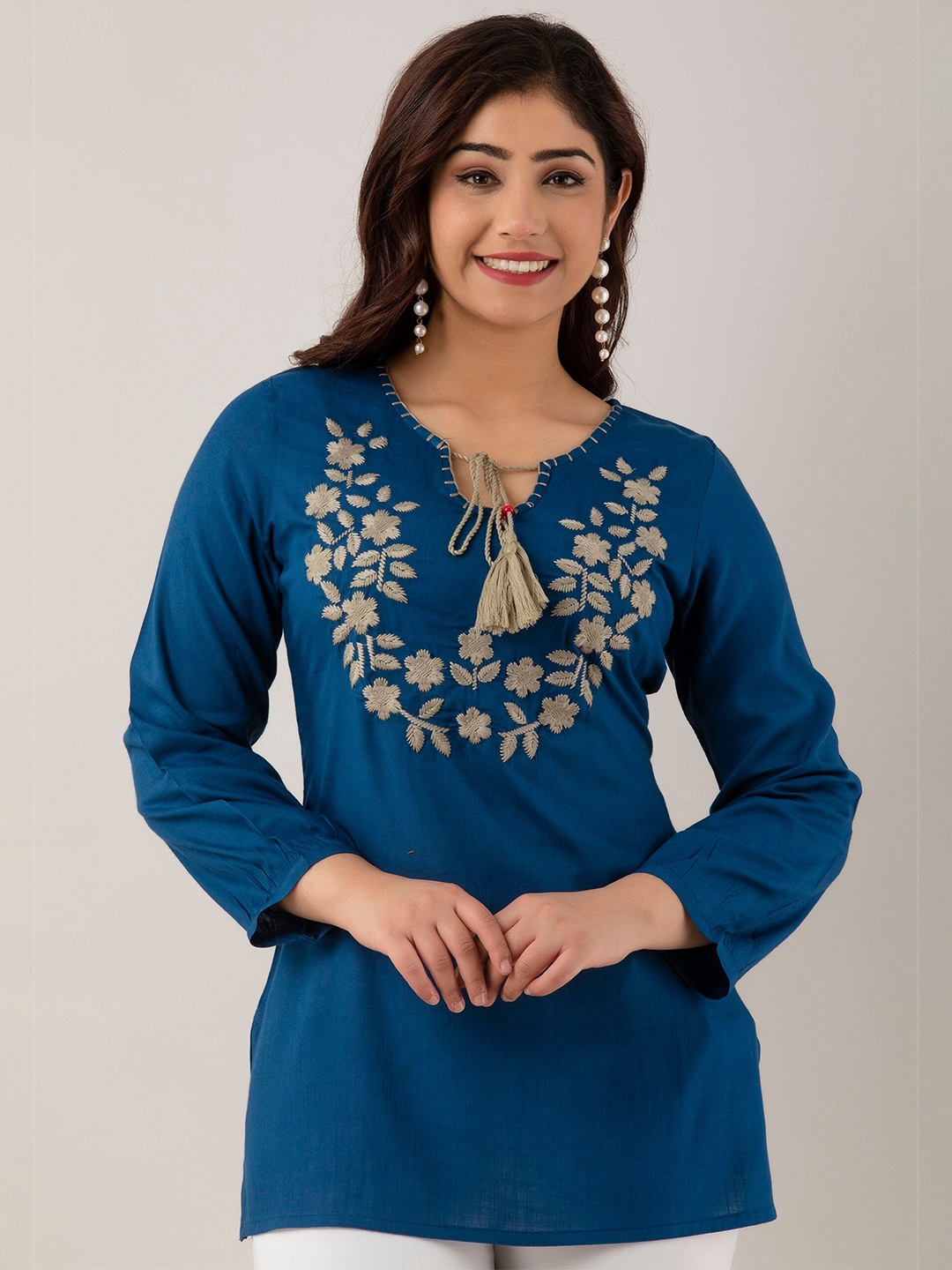 

CKM Floral Embroidered Tie-Up Neck Straight Kurti, Blue