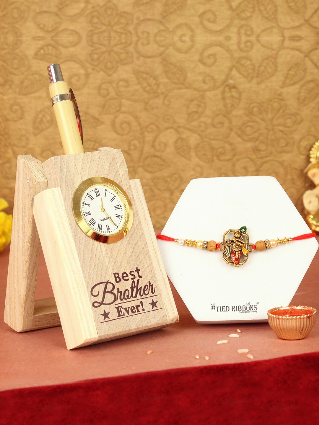 

TIED RIBBONS Krishna Rakhi With Penstand Clock & Card Gift Set, Gold