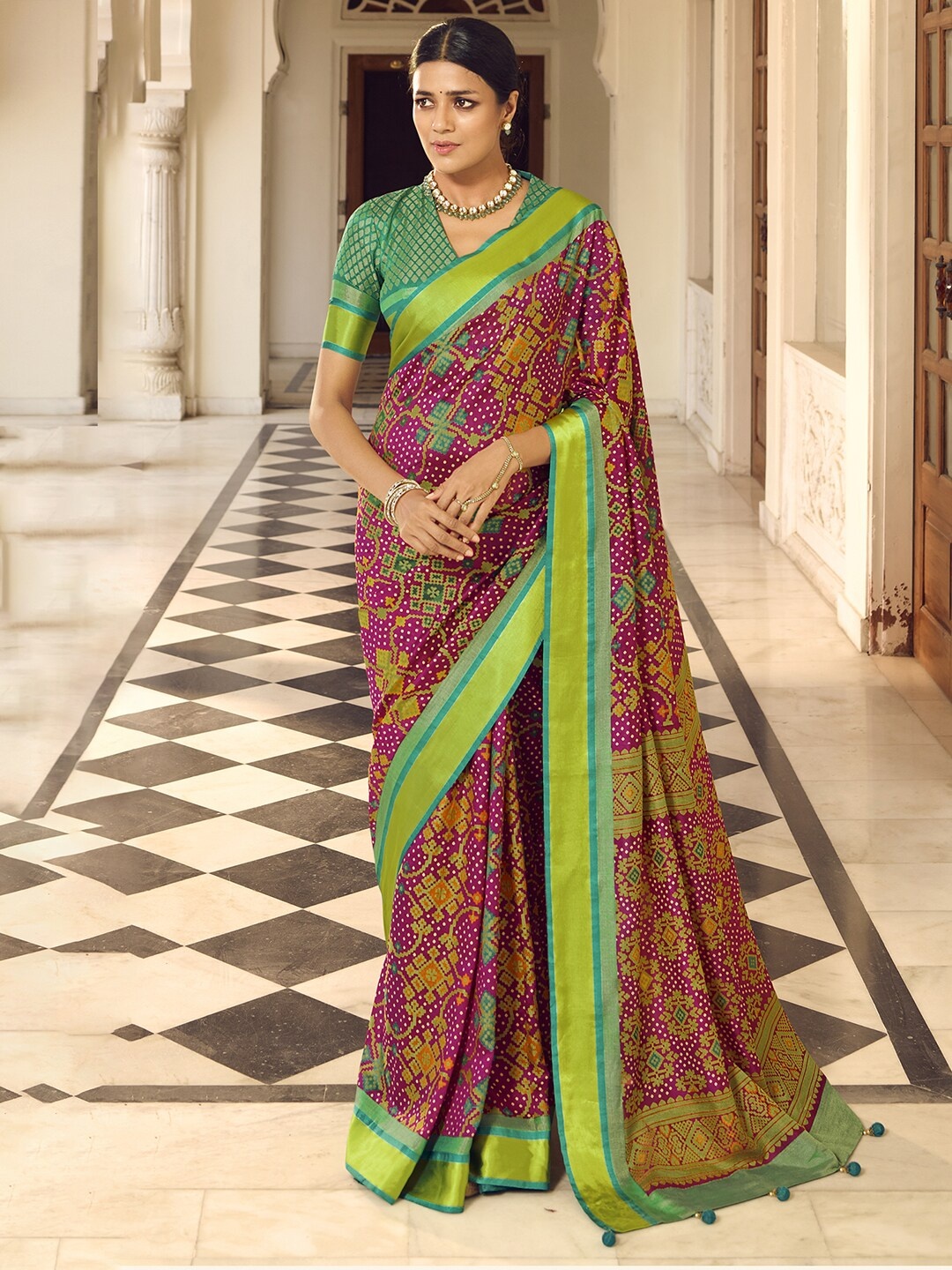 

Anouk Magenta & Green Ethnic Motifs Printed Zari Pure Georgette Saree