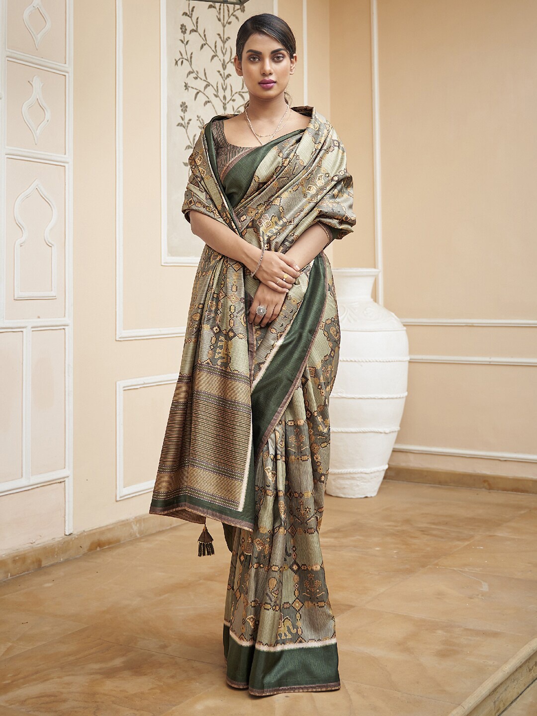 

Anouk Green & Gold-Toned Ethnic Motifs Printed Ikat Saree
