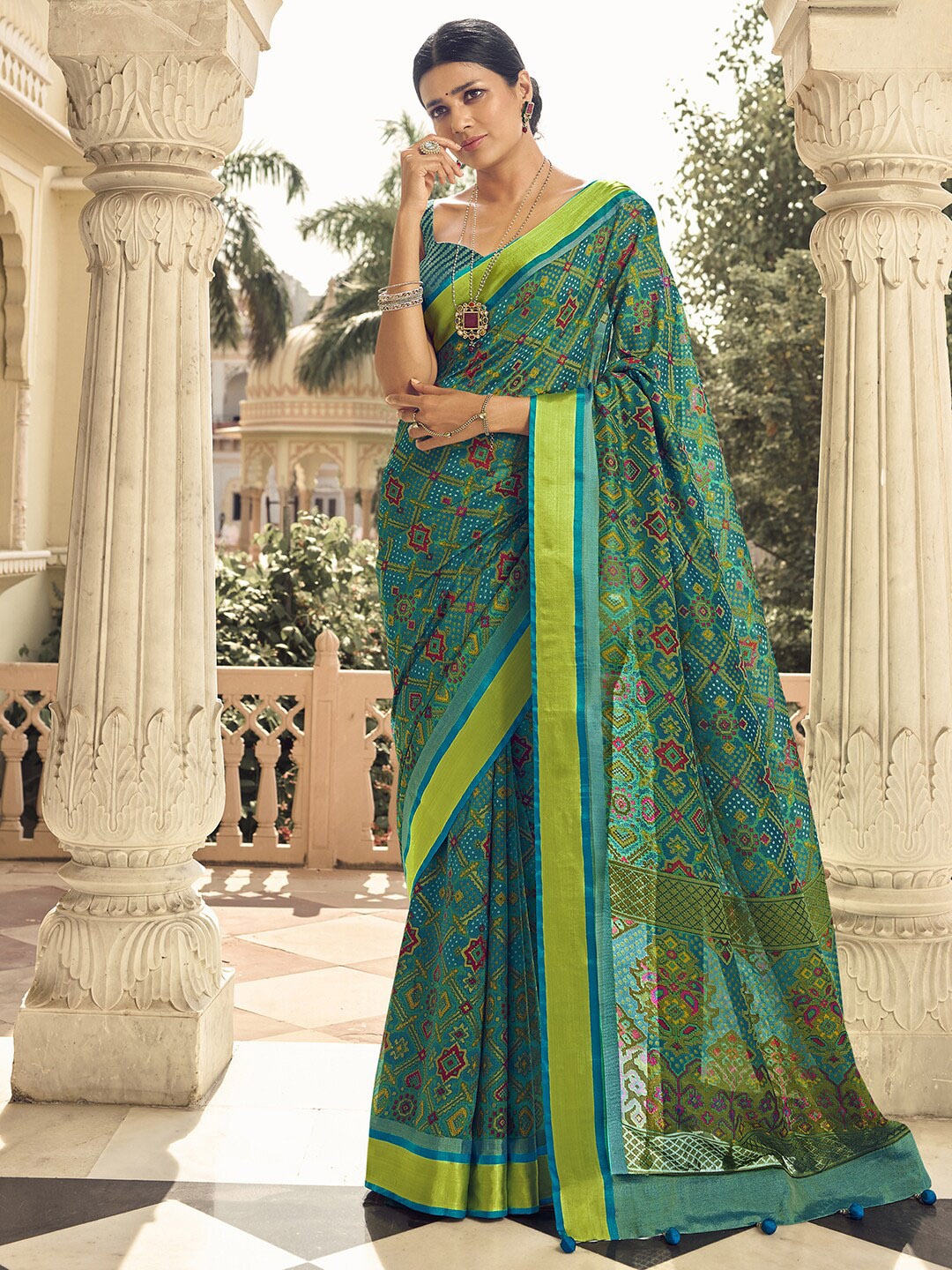 

Anouk Ethnic Motifs Printed Pure Georgette Bandhani Saree, Teal