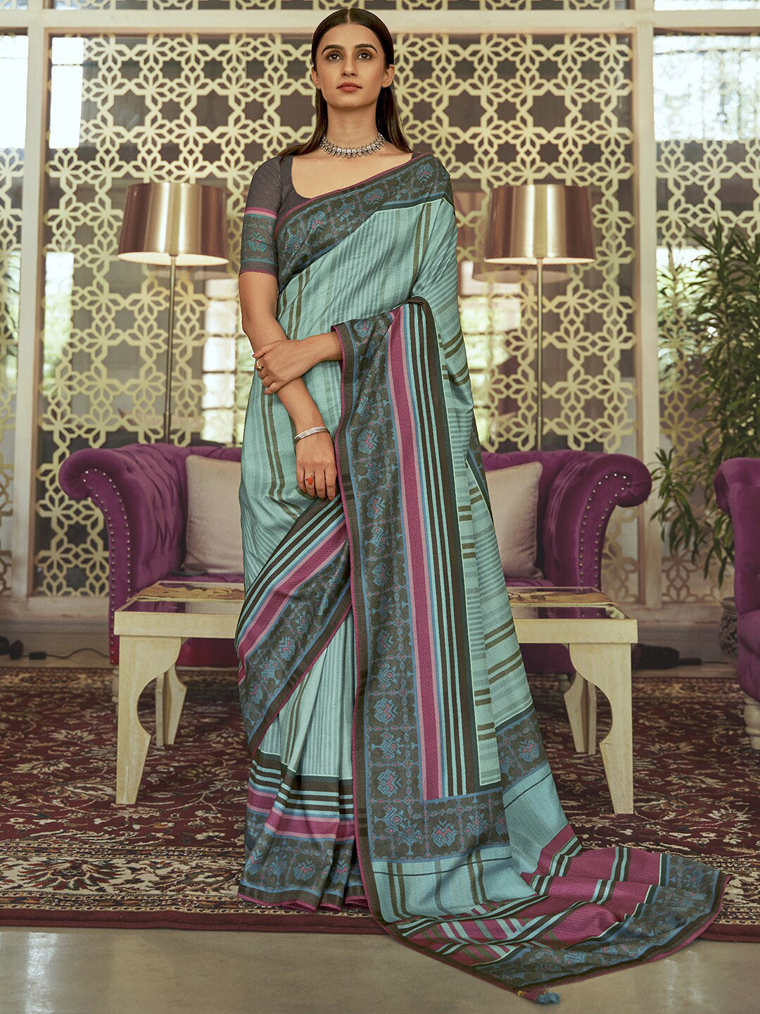 

Anouk Blue & Mauve Striped Silk Blend Saree