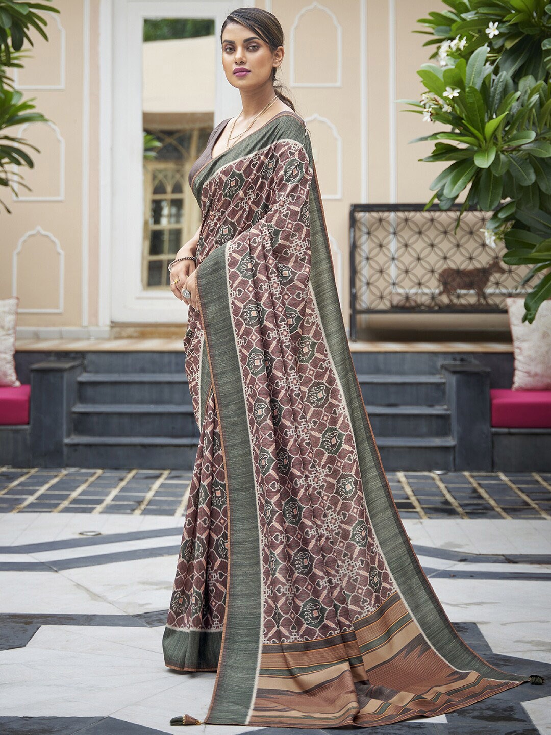 

Anouk Brown & Mauve Ethnic Motifs Printed Ikat Saree