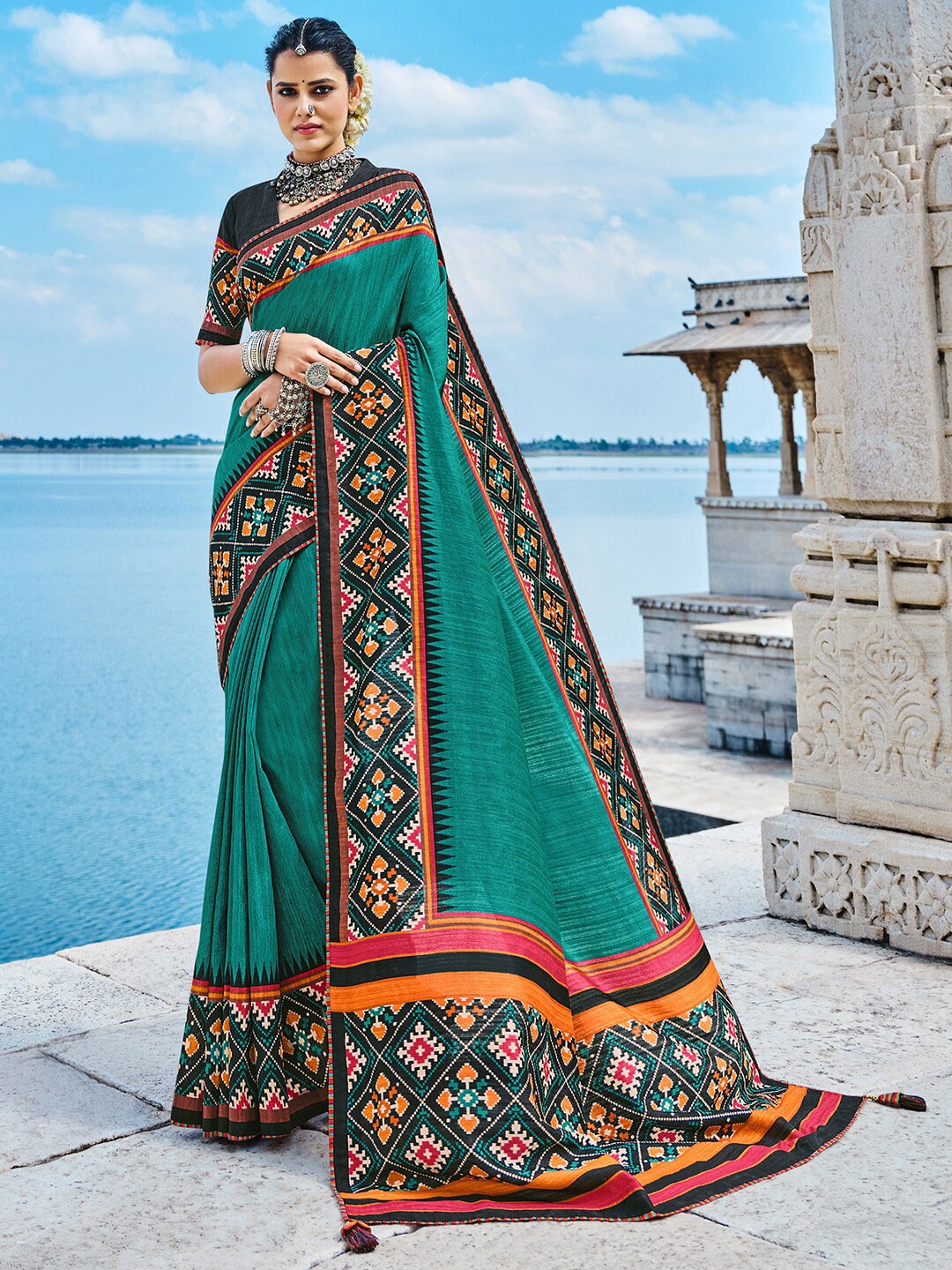 

Anouk Teal & Orange Ethnic Printed Border Saree