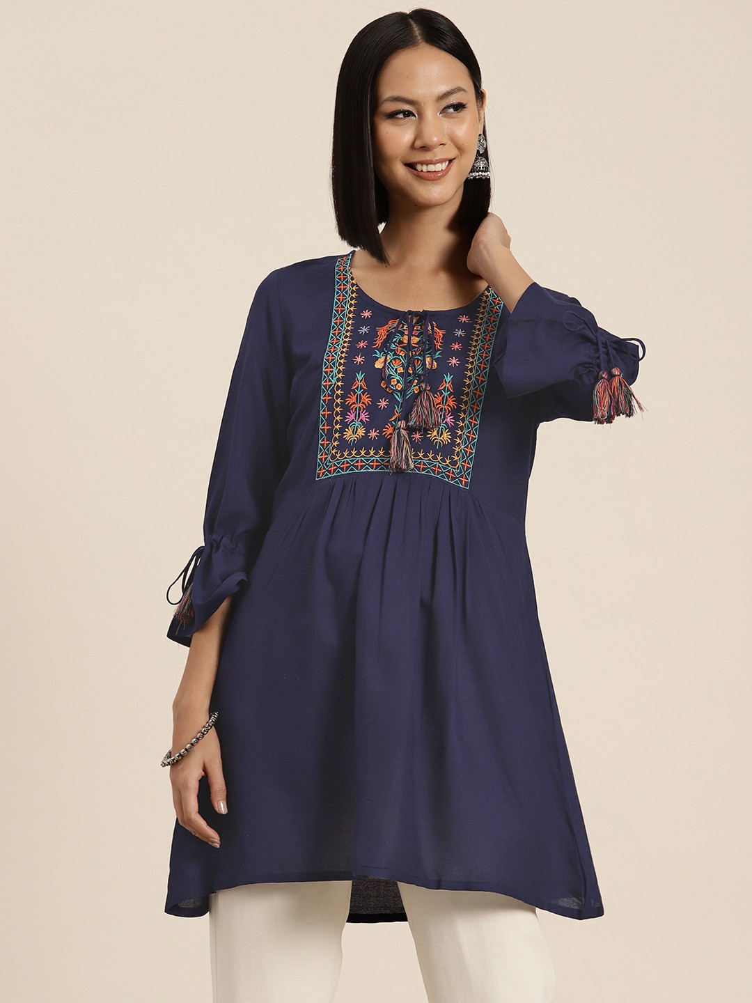 

HERE&NOW Floral Embroidered Tie-Up Neck Bell Sleeves Kurti, Navy blue