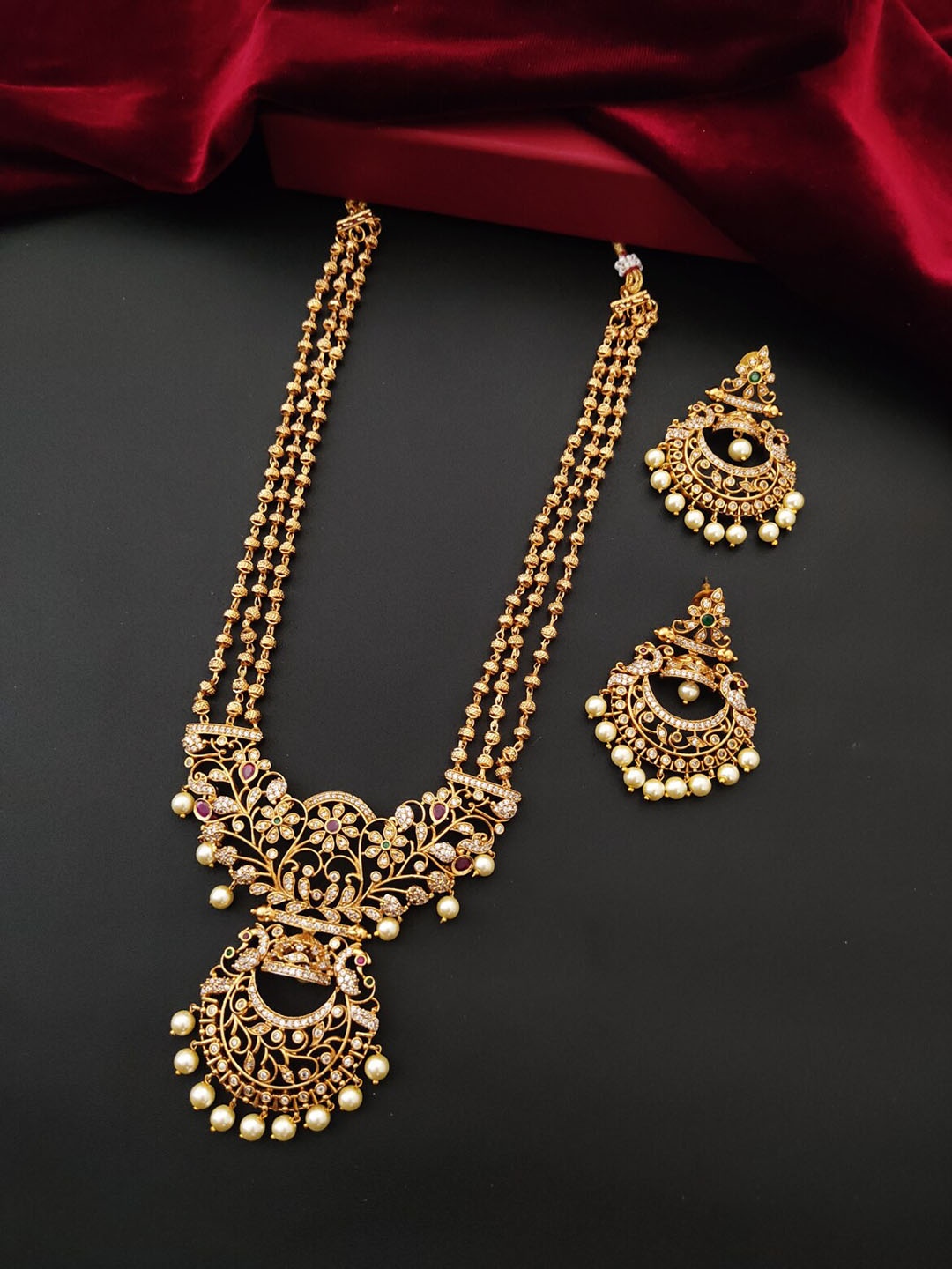 

Pihtara Jewels Gold-plated AD Studded & Pearl Jewellery Set