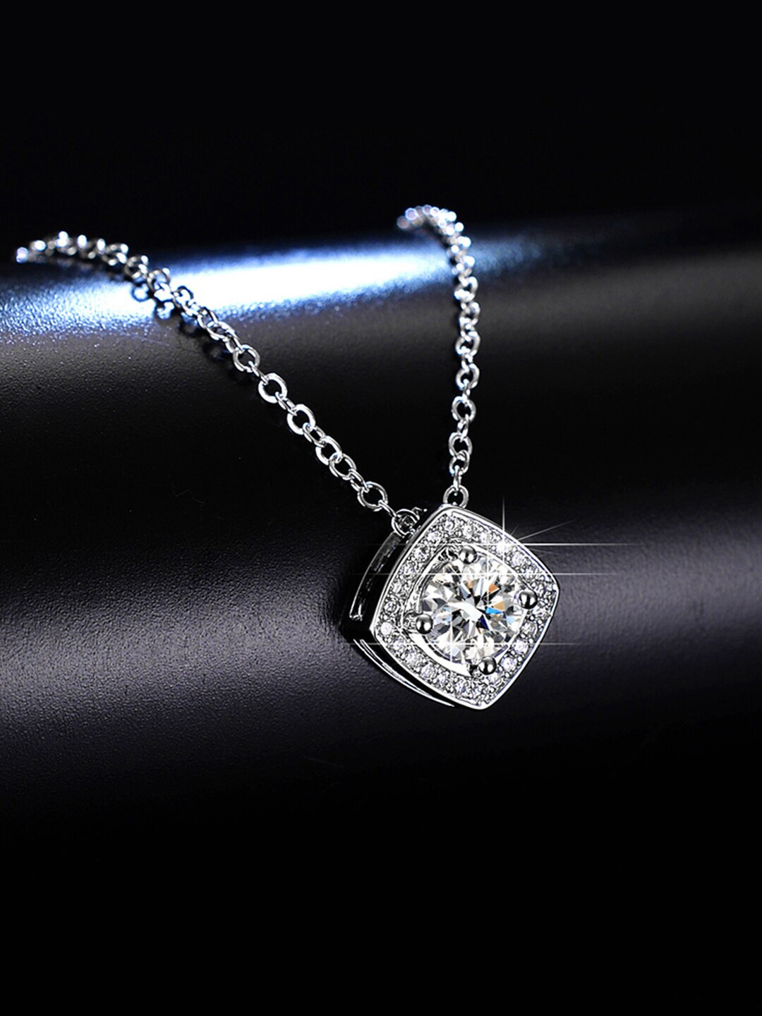 

Jewels Galaxy Silver-Plated Anti-Tarnish Crystal-Studded Solitaire Pendant With Chain