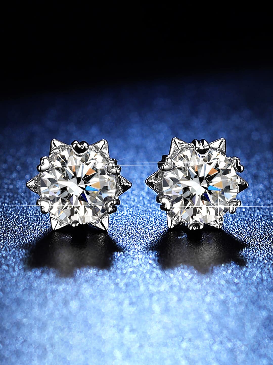 

Jewels Galaxy Silver-Plated Star Shaped American Diamond Studs Earrings