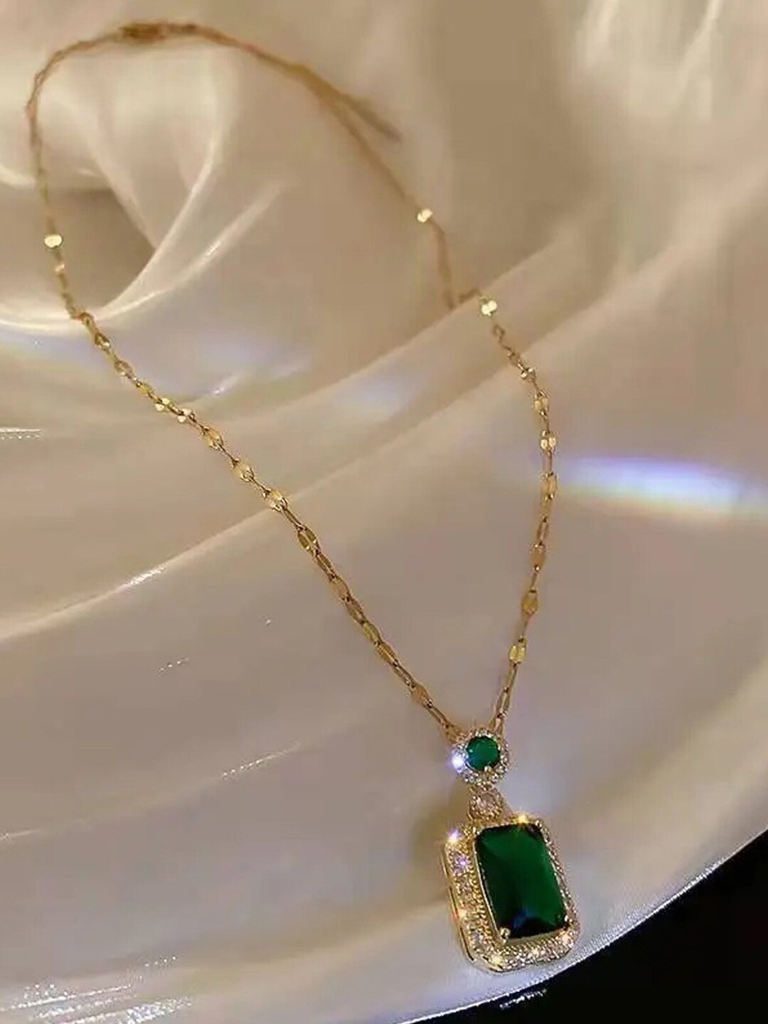 

Jewels Galaxy Gold-Plated CZ Studded Circular Pendant With Chain